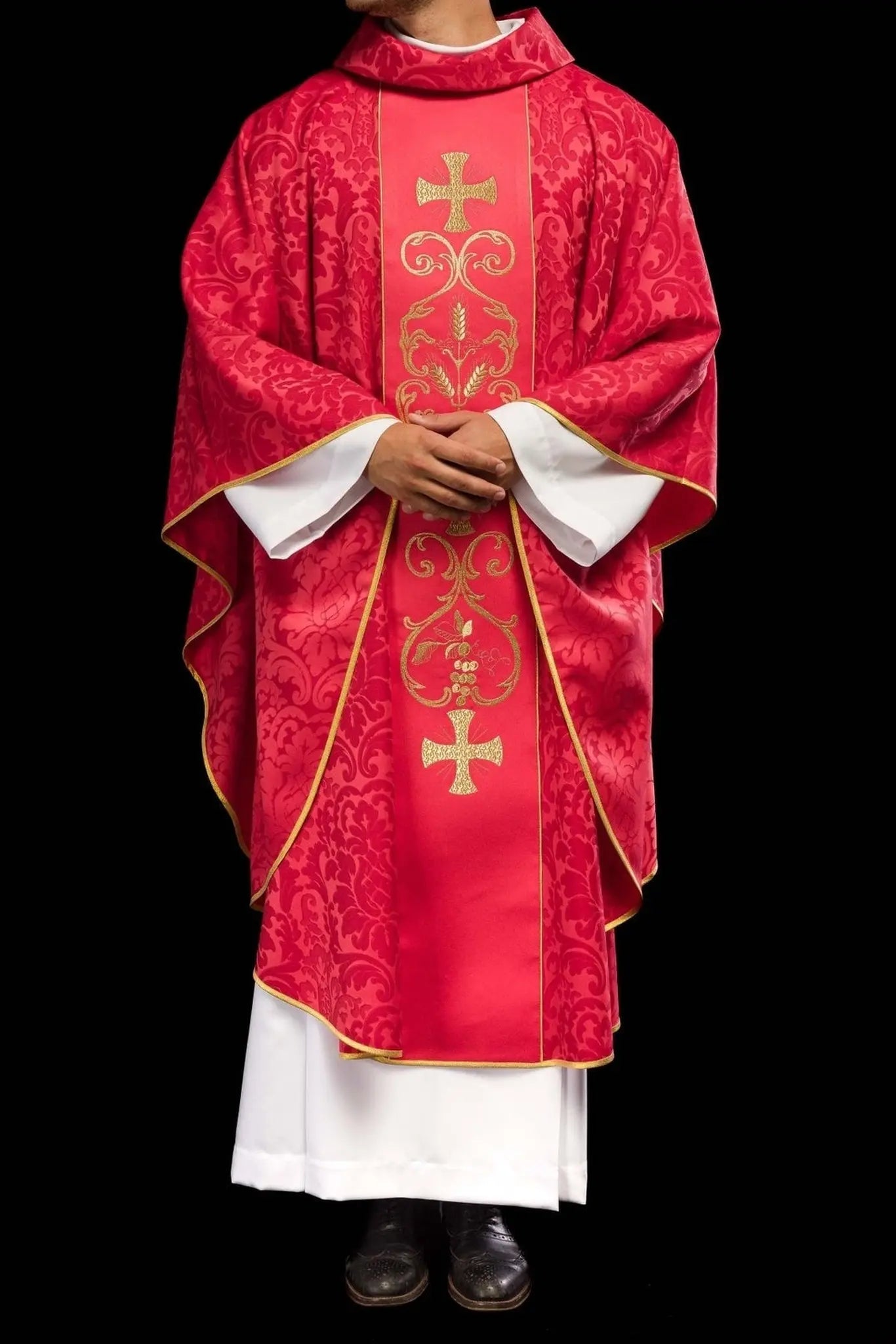 Red liturgical chasuble decorated with embroidered belt