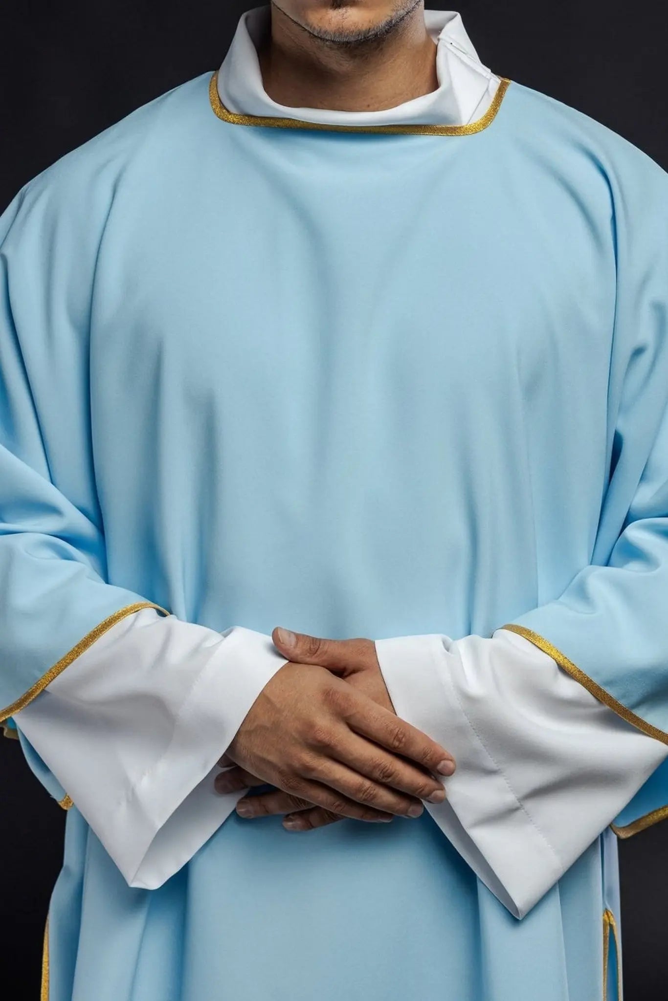 Embroidered plain dalmatics with gold trim blue