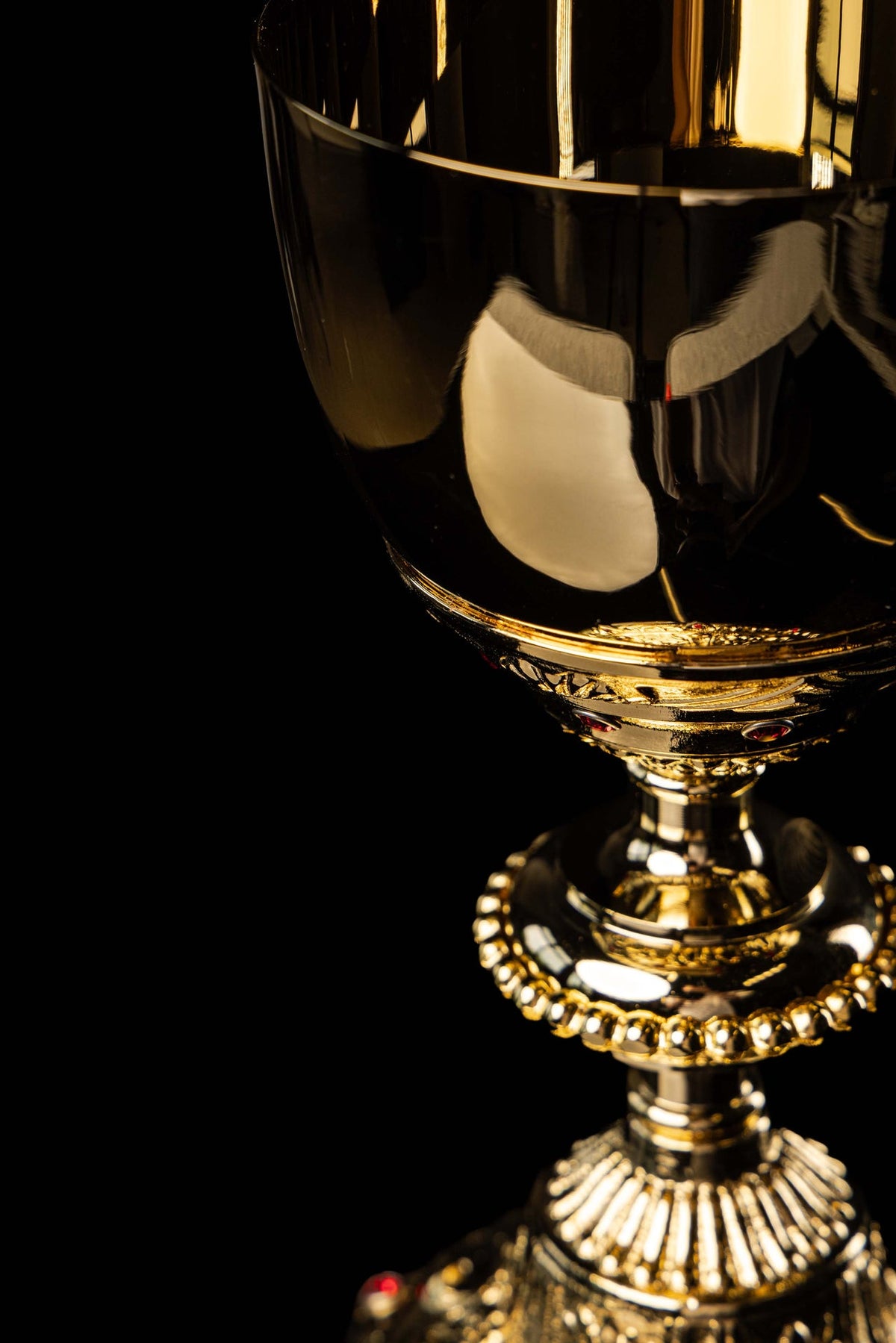 Gold-plated chalice with Baroque plant motifs and faux rubies, cup close-up