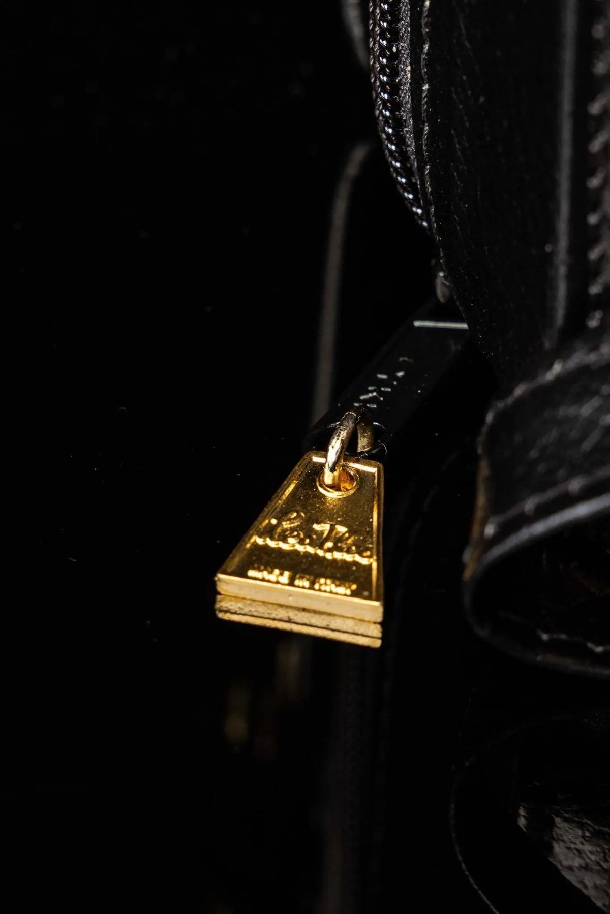 Black Mission Case with Liturgical Equipment and Shoulder Strap, strap hardware close-up