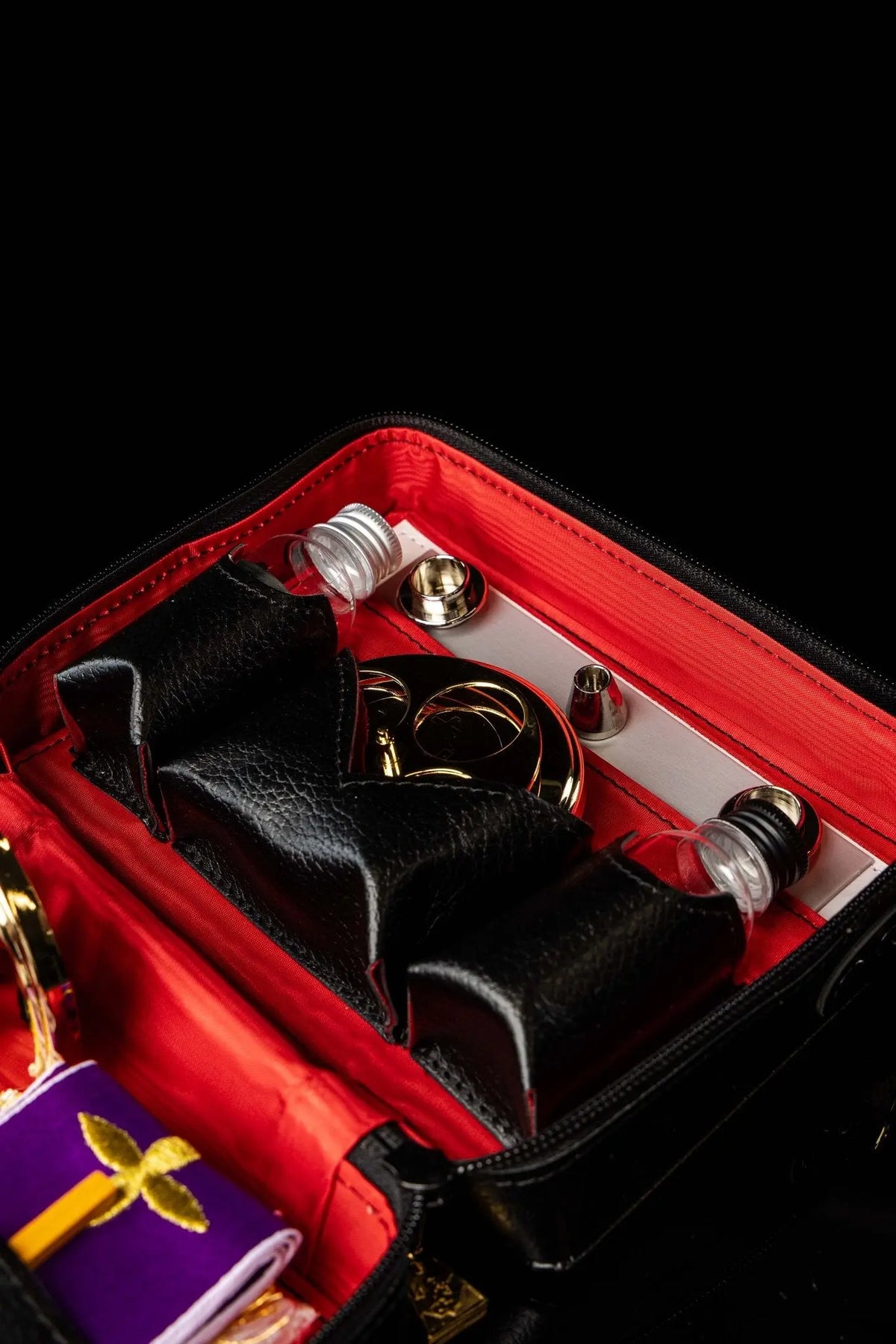 Mission case liturgical equipment set, close-up of metal vessels and accessories