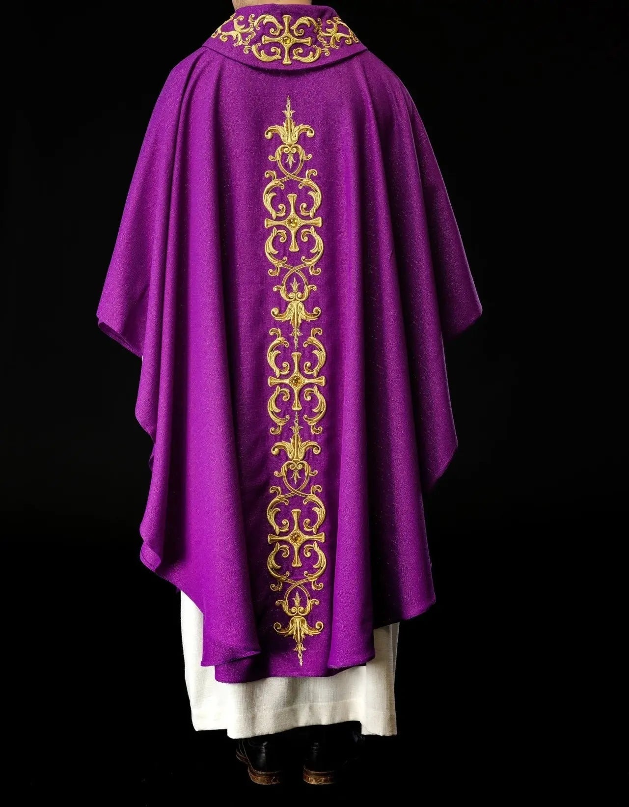 Purple chasuble richly embroidered with stones