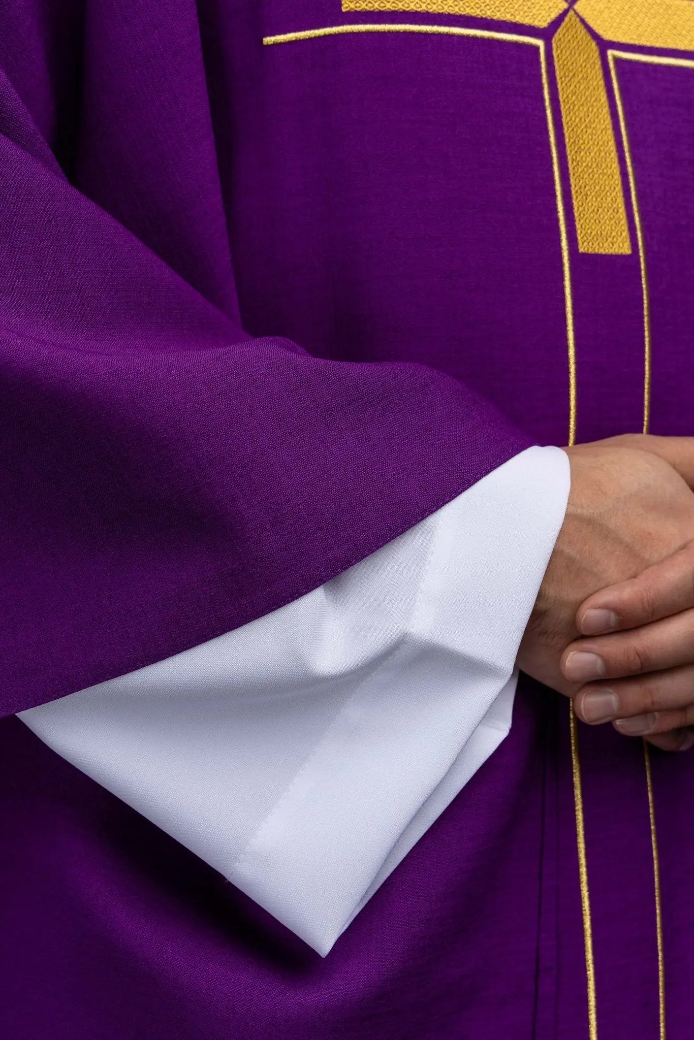 Purple chasuble with an embroidered cross motif
