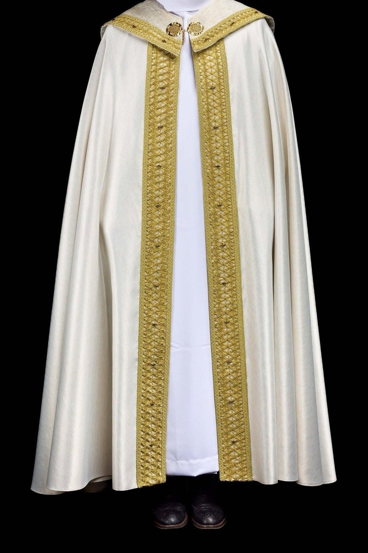 White and gold cope with embroidered trim, front worn view