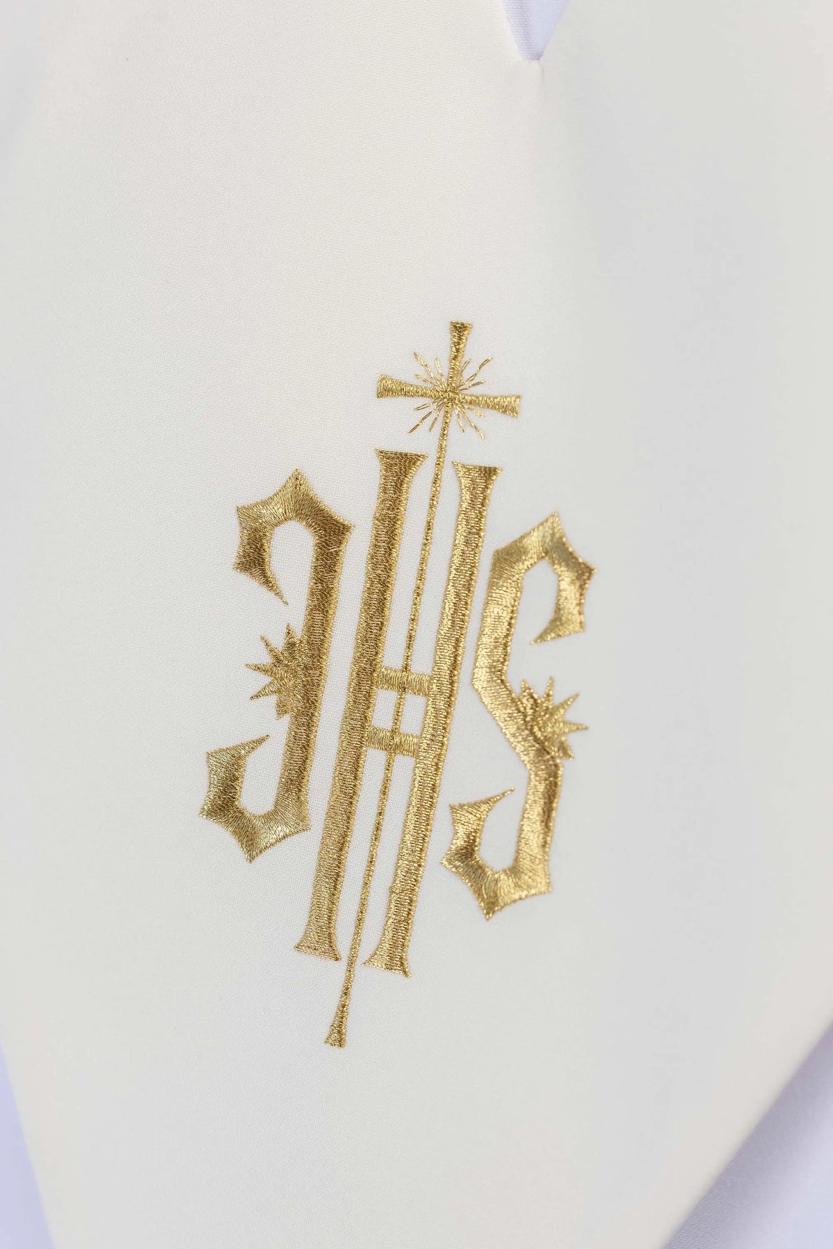 Ecru lector's scapular with IHS Christogram embroidery, detailed close-up