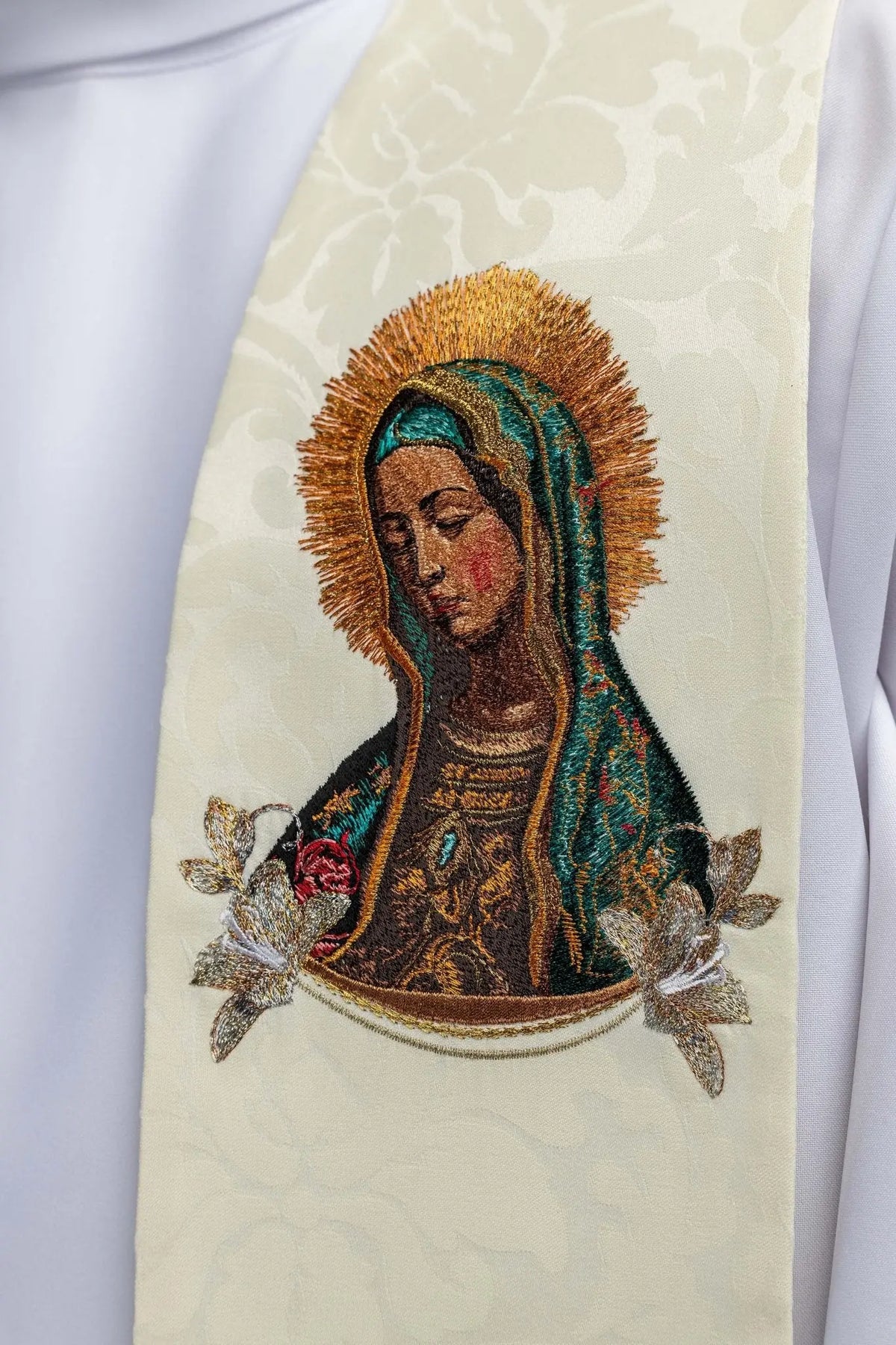 Ecru stole with Our Lady of Guadalupe embroidery, close-up view