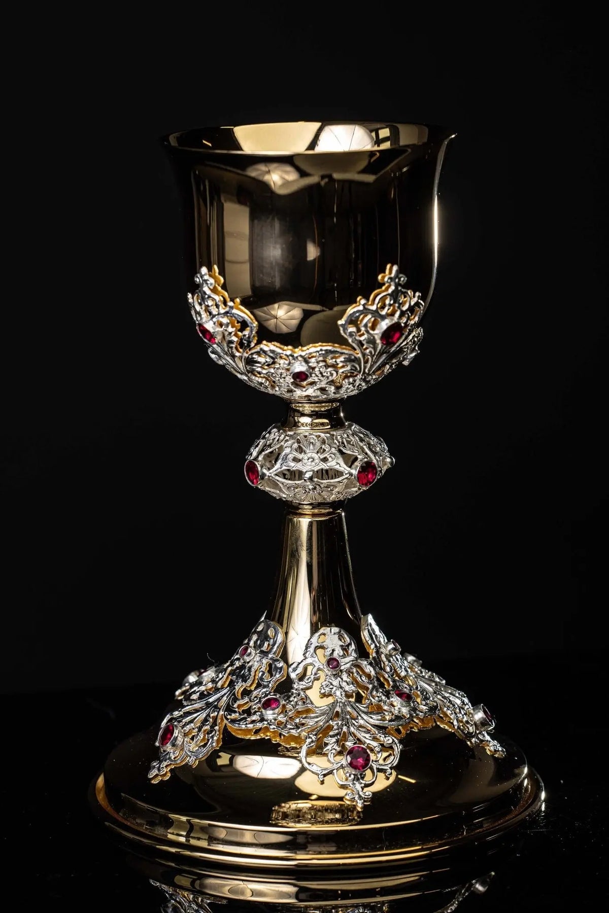 Gold chalice with openwork plant ornaments and rubies, full front view