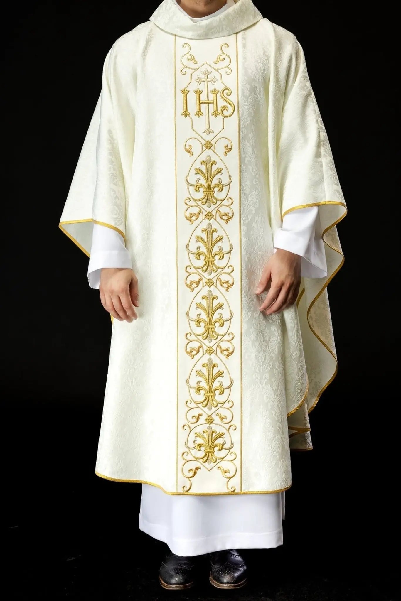 Ecru chasuble embroidered on decorative fabric with IHS symbol