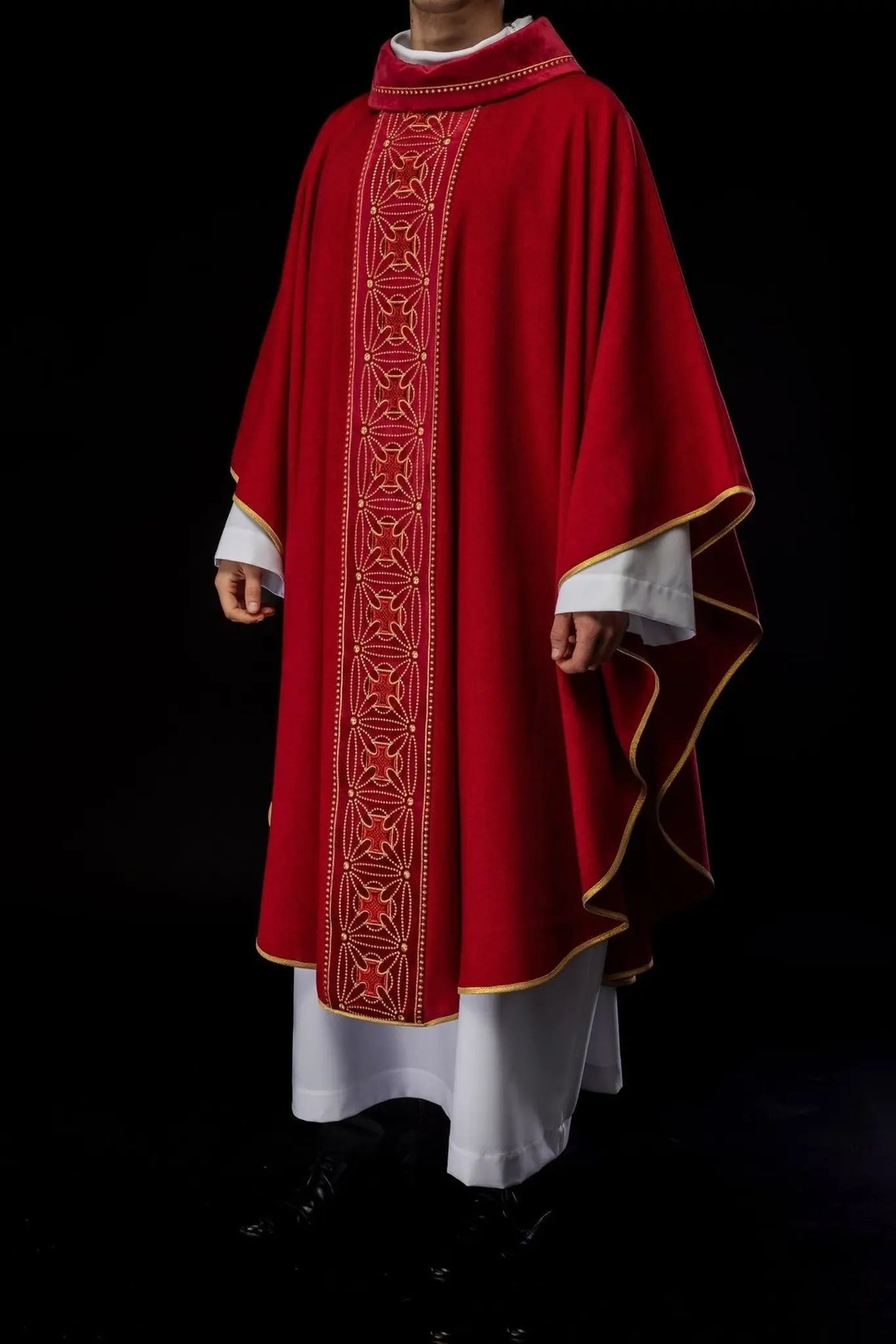 Liturgical chasuble with richly decorated belt with crosses in red color