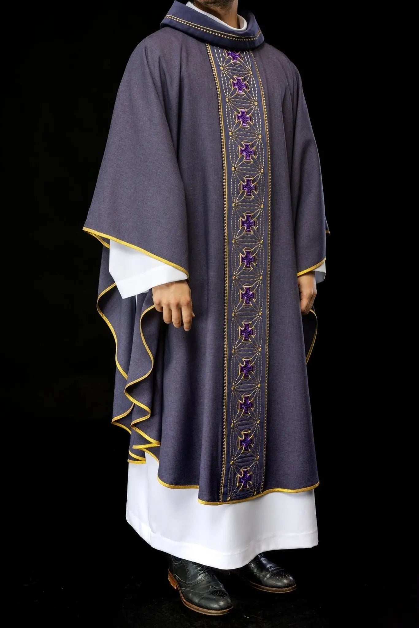 Liturgical chasuble with richly decorated belt with crosses in purple color