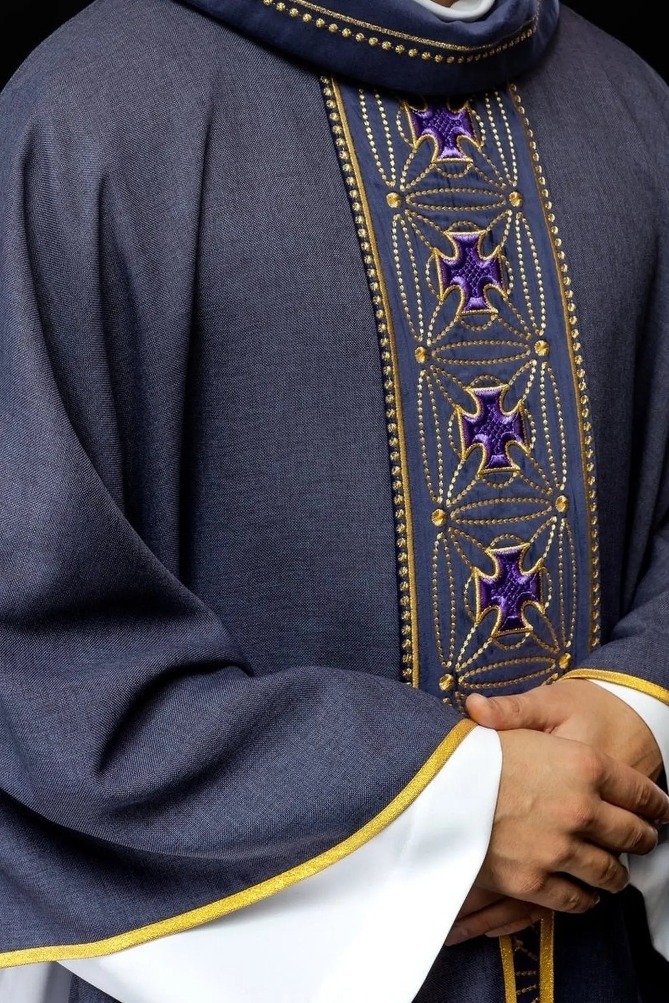 Liturgical chasuble with richly decorated belt with crosses in purple color