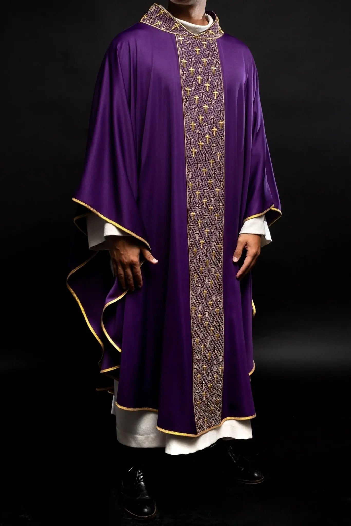Chasuble with richly embroidered belt with crosses in purple color