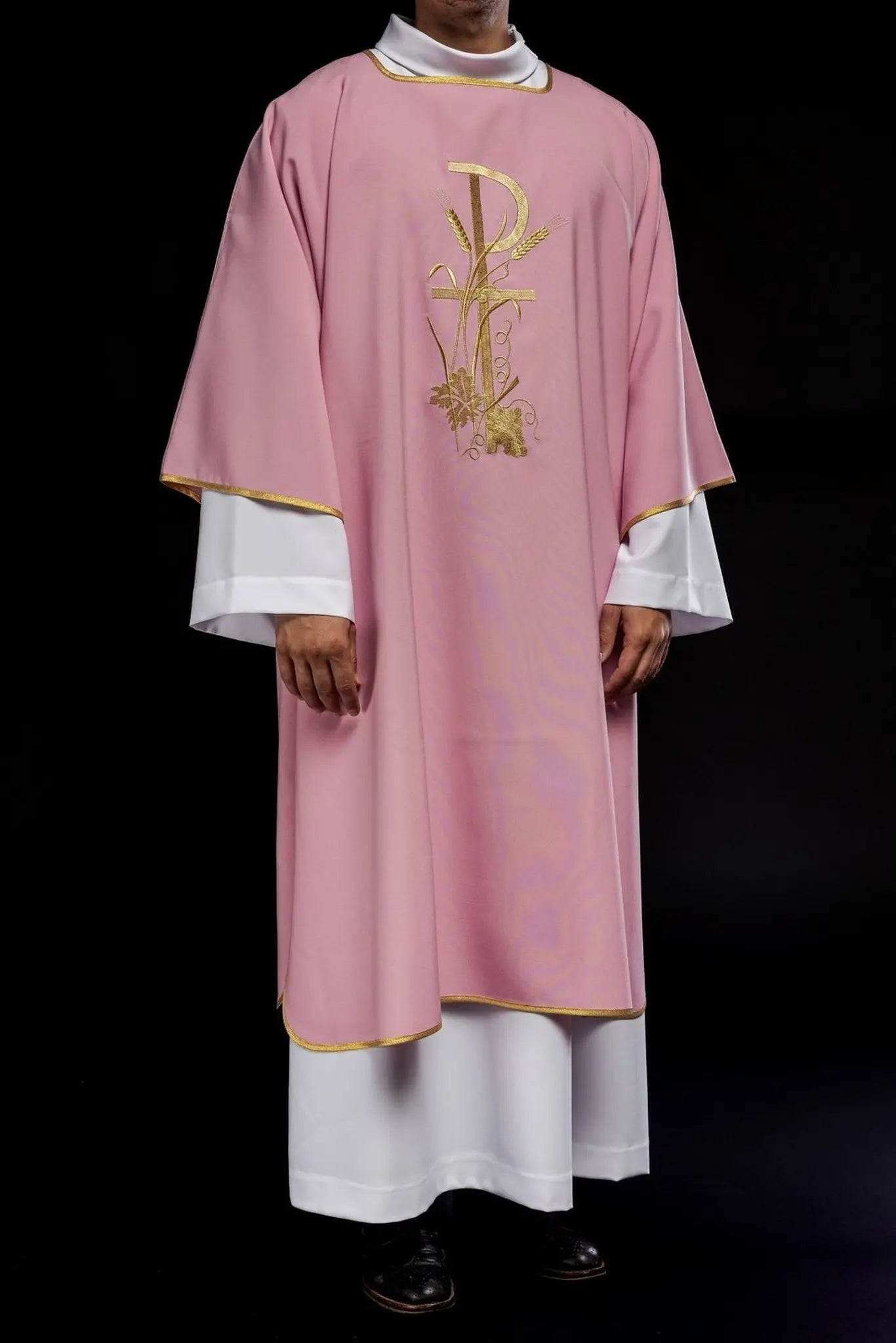 Pink dalmatica with gold Pax cross embroidery
