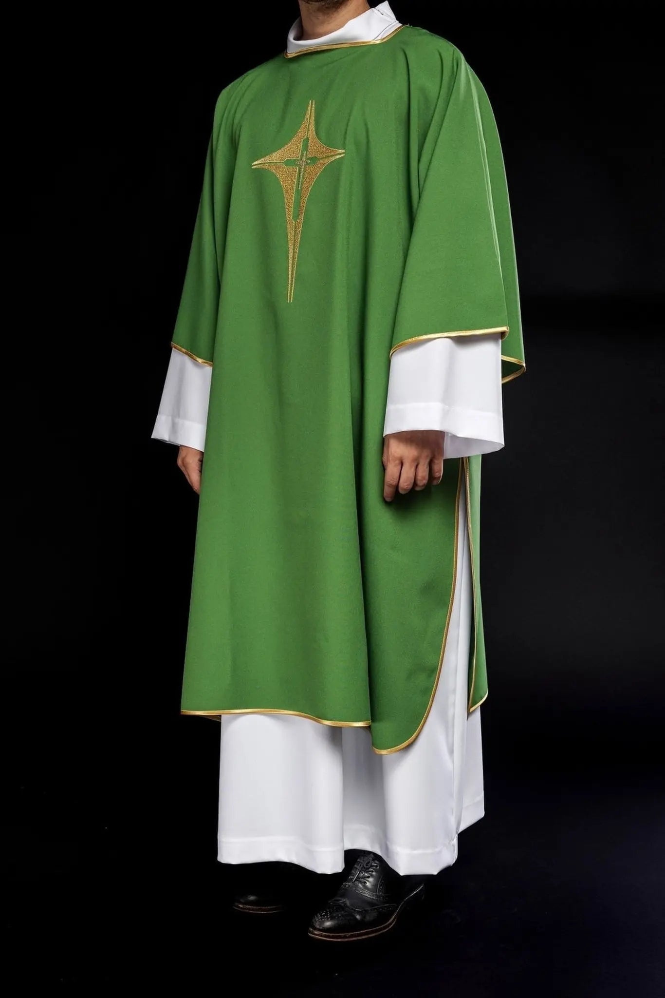 Green Dalmatian with embroidered gold cross