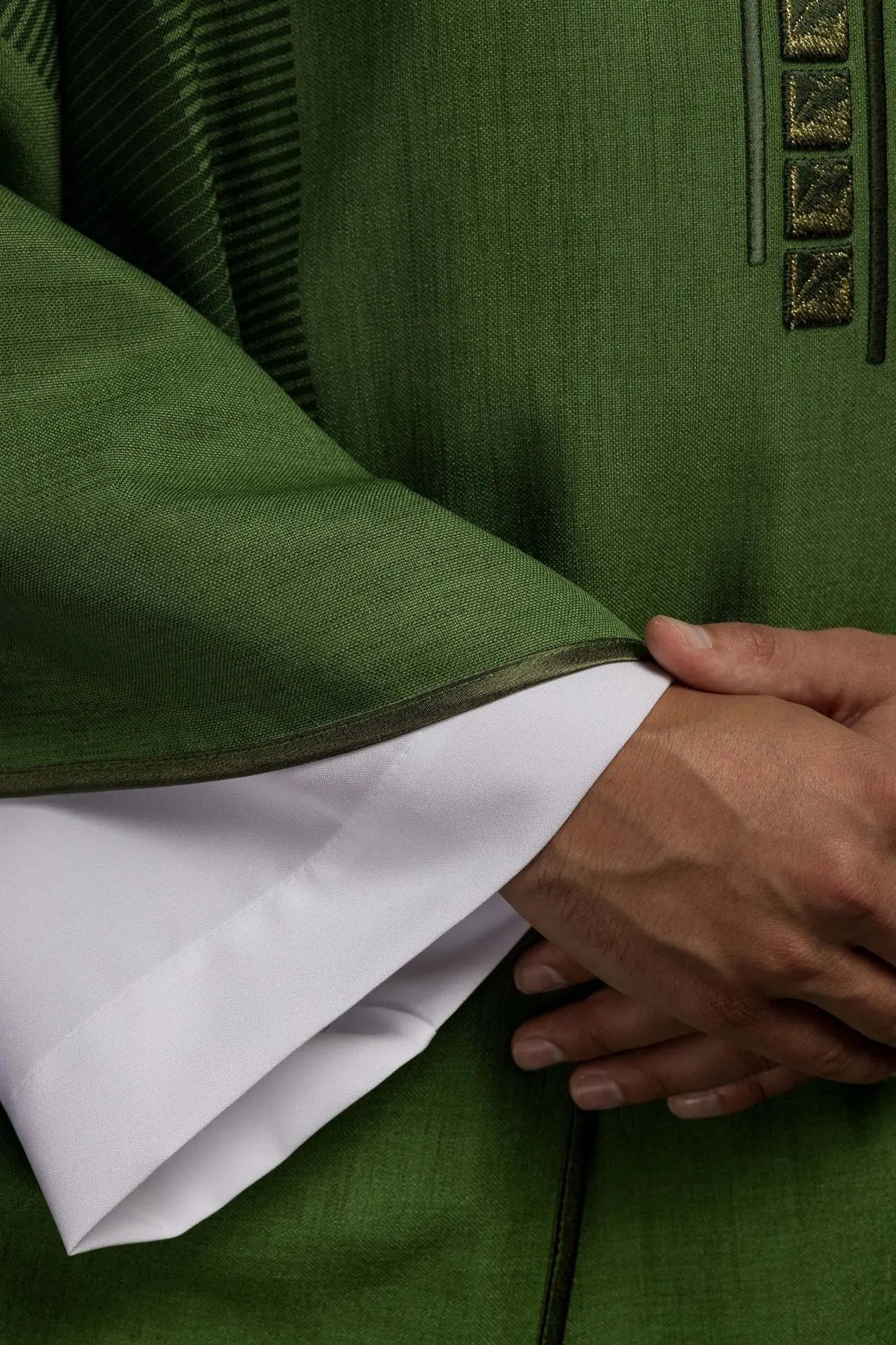 Green liturgical chasuble with cross