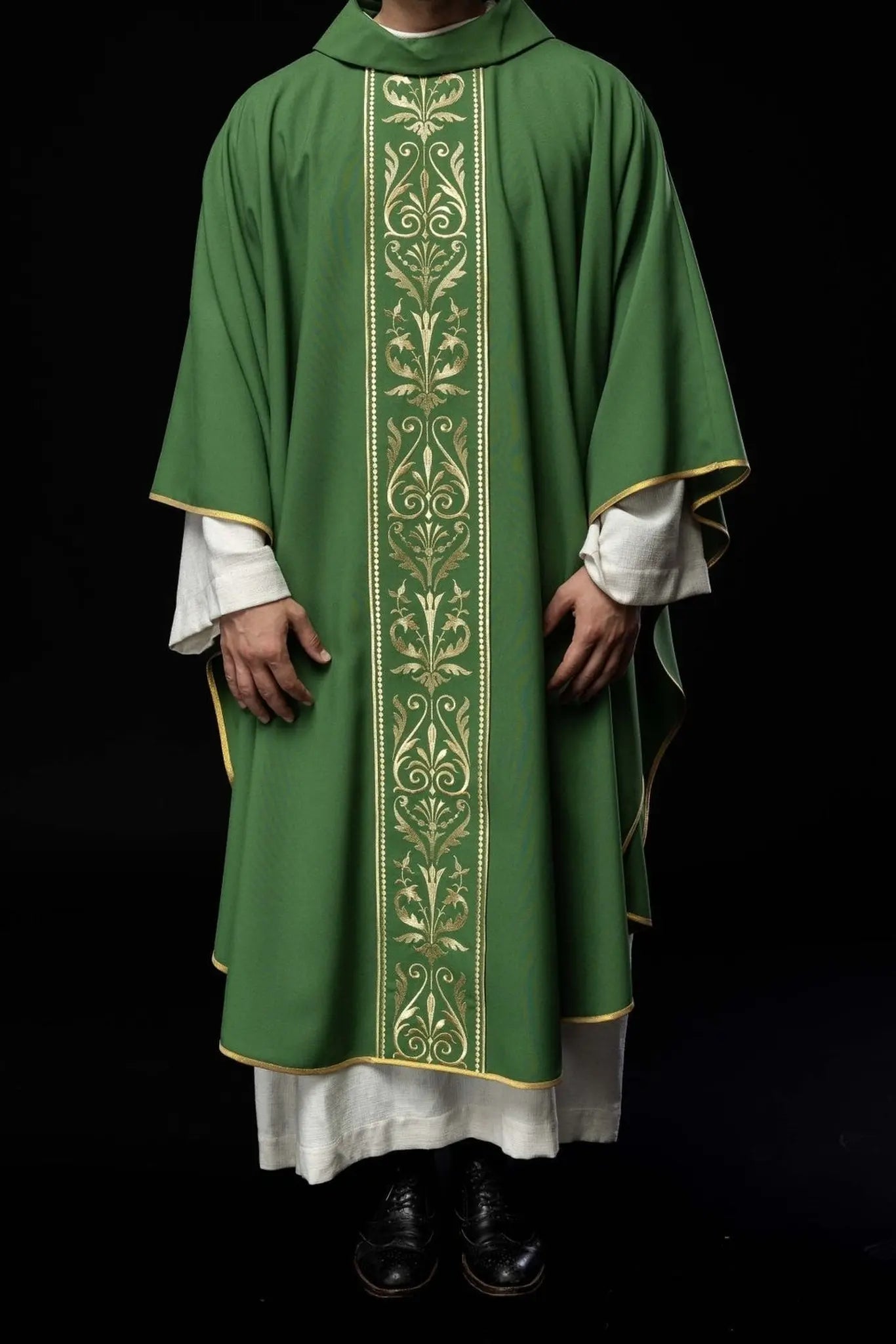 Green liturgical chasuble decorated with gold embroidered belt