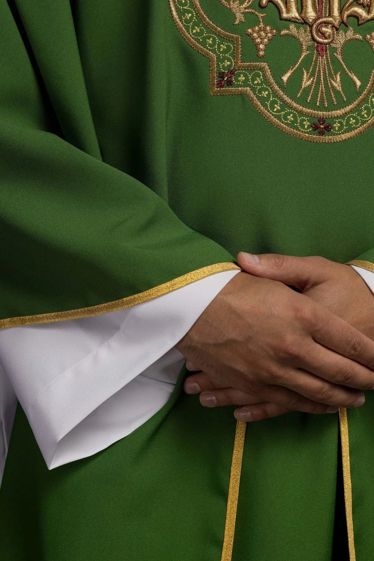 Green chasuble with IHS and PAX embroidery