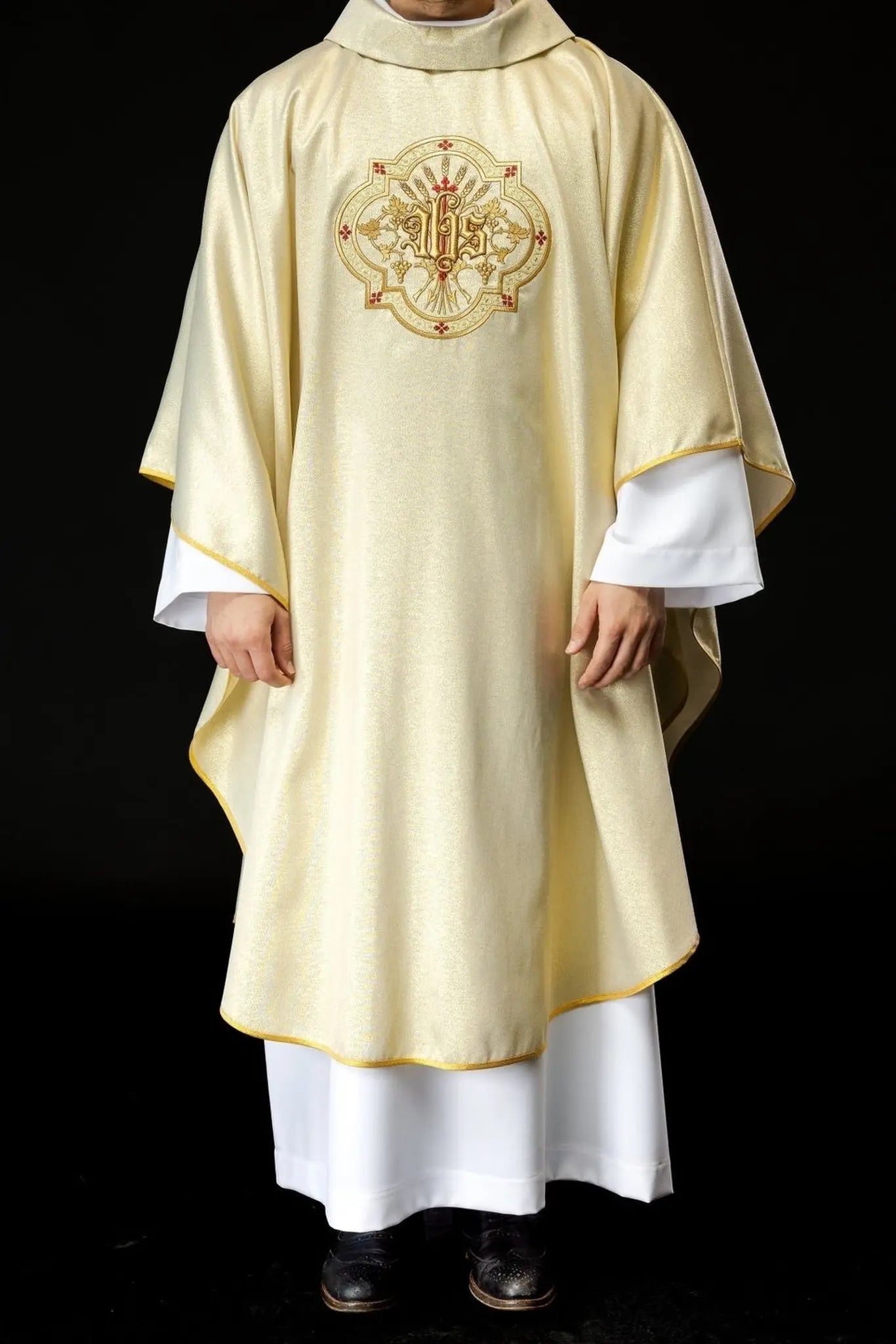 Gold chasuble with IHS and PAX embroidery