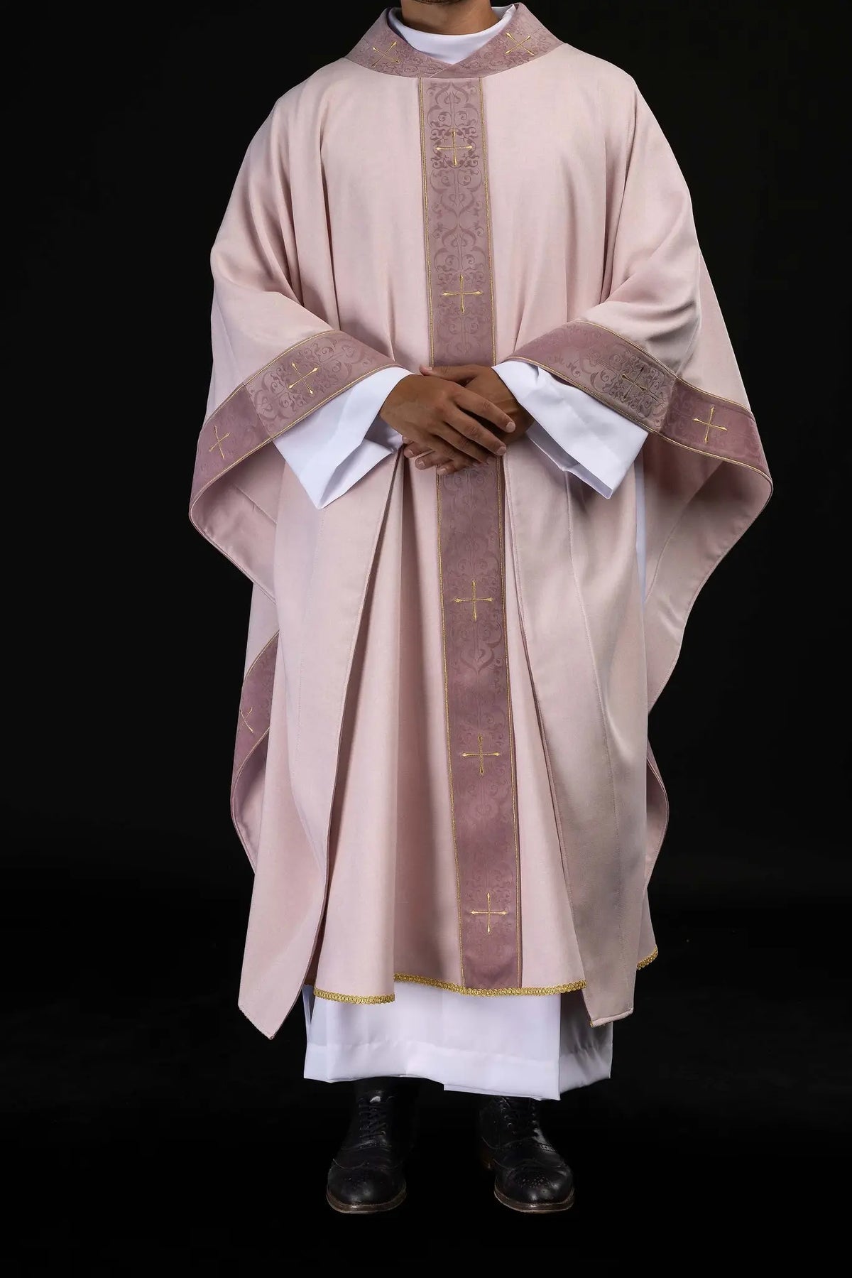 Rose chasuble with gold crosses and scrollwork, full front view