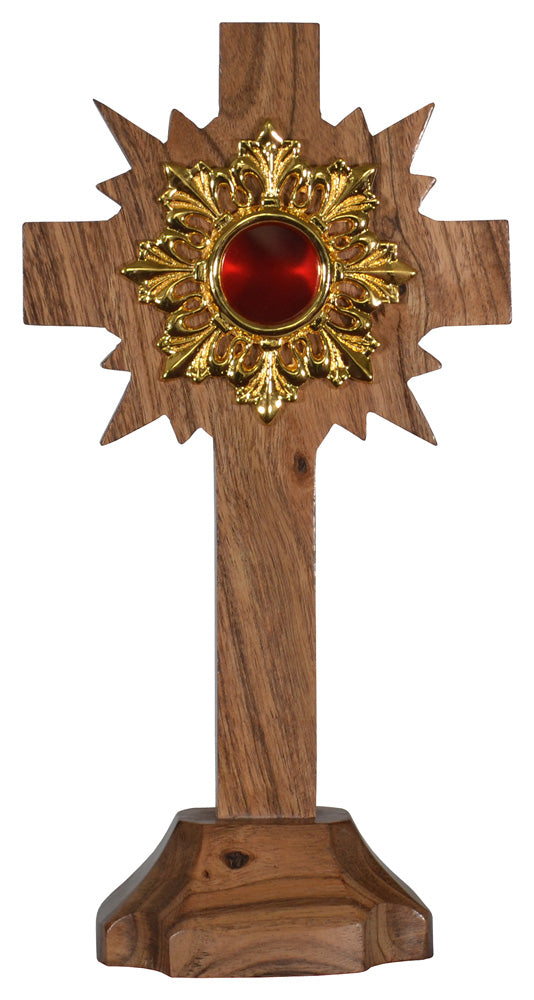 Relikwiarz drewniany w kształcie krzyża z dekoracją słońca