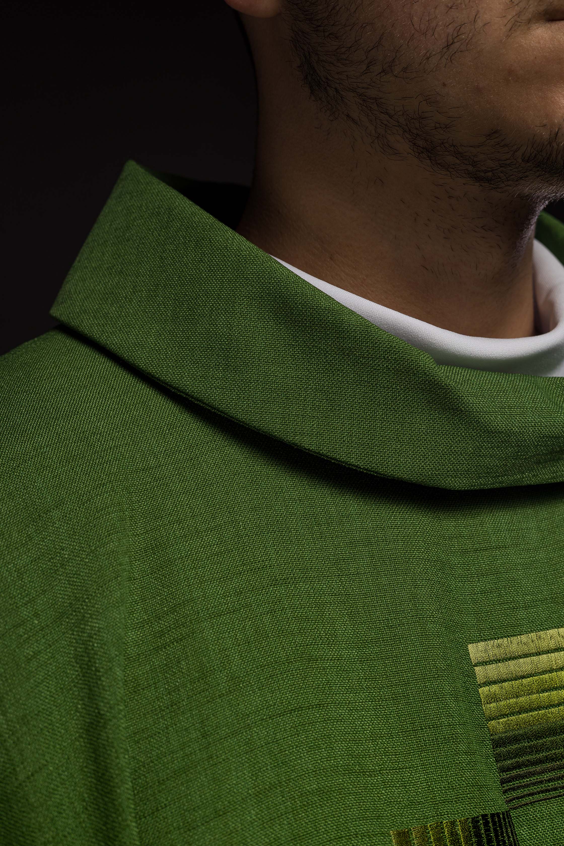 Green chasuble with embroidered crosses