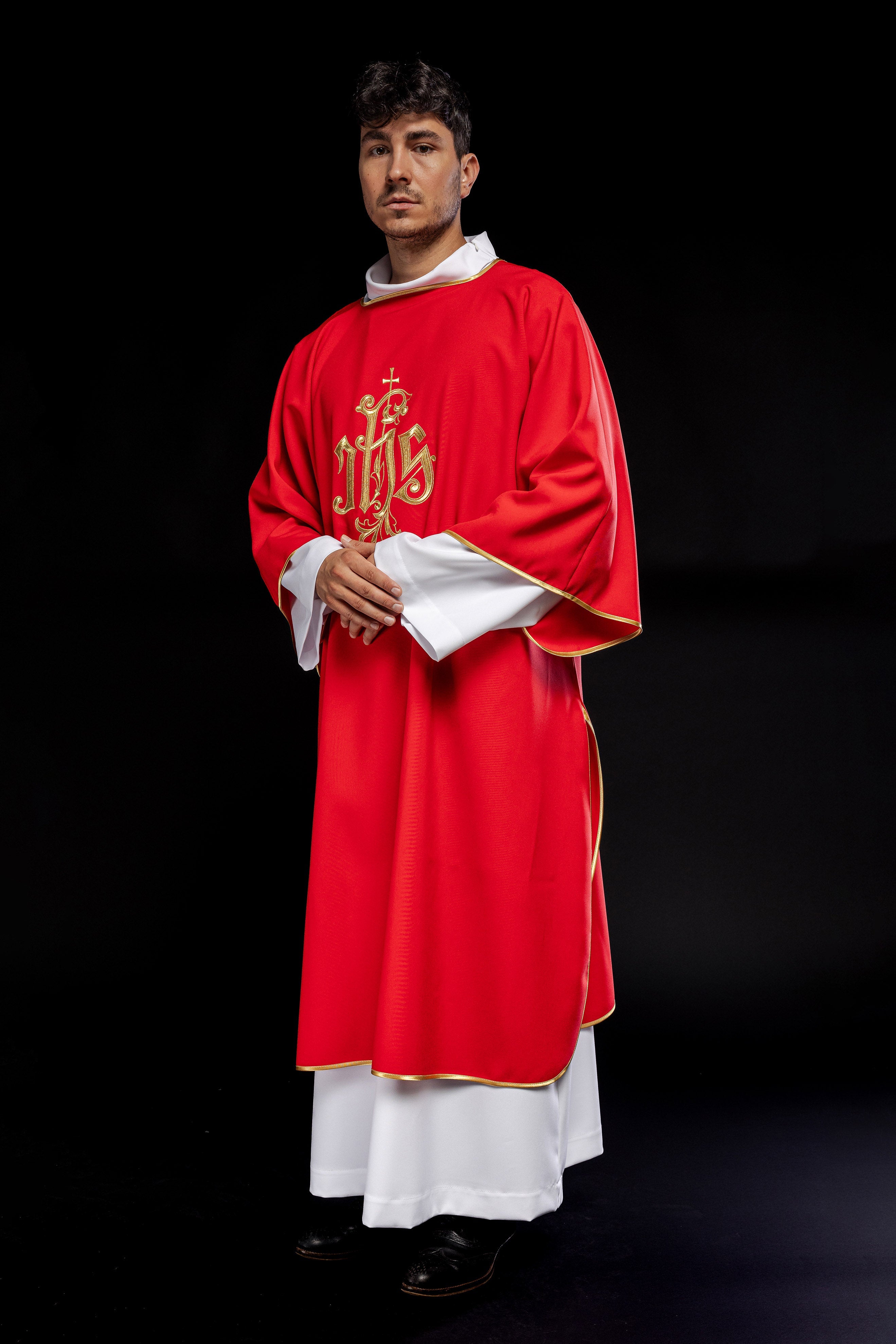 Red dalmatic with embroidered IHS design