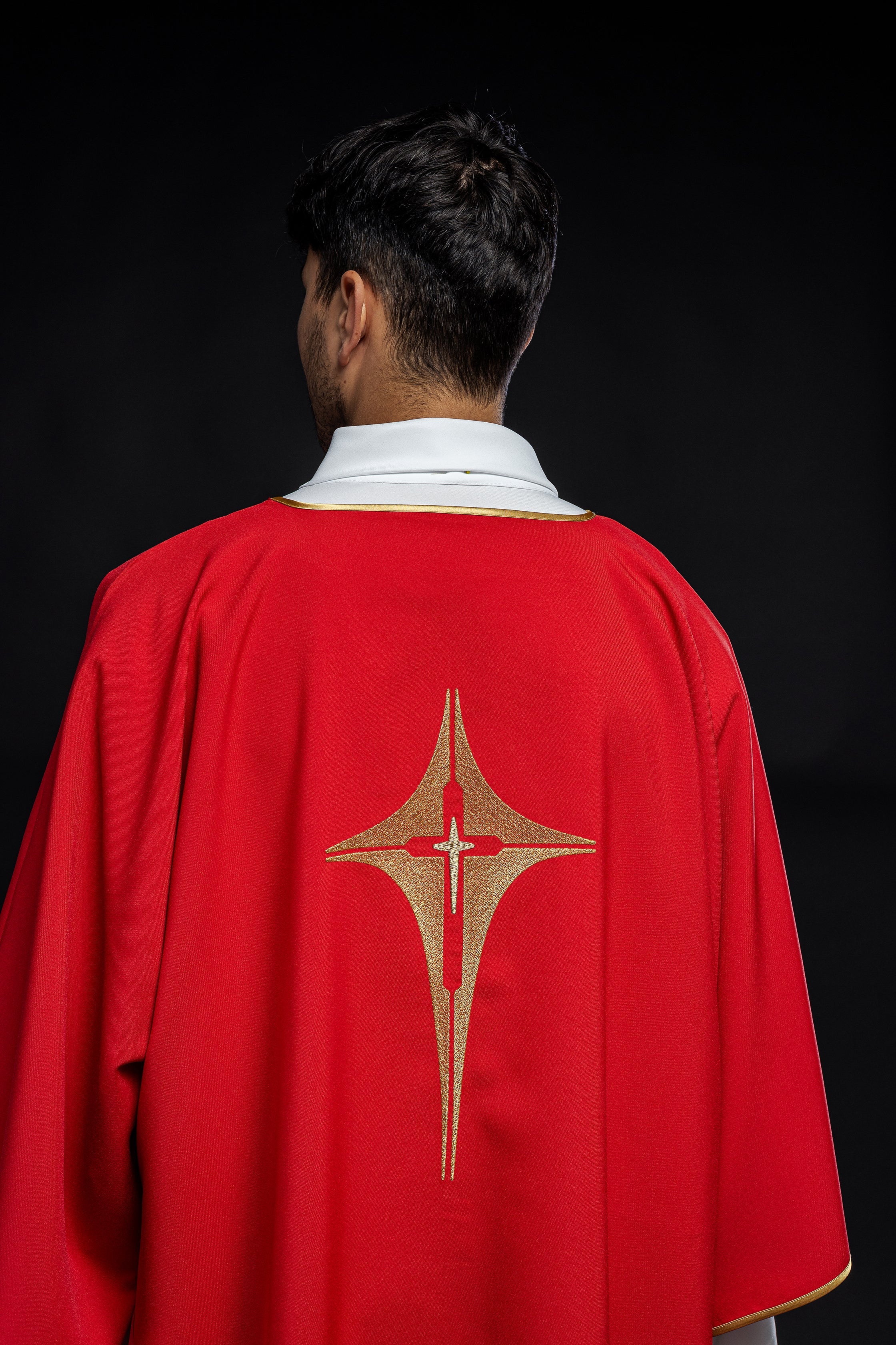 Red Dalmatia with embroidered gold cross