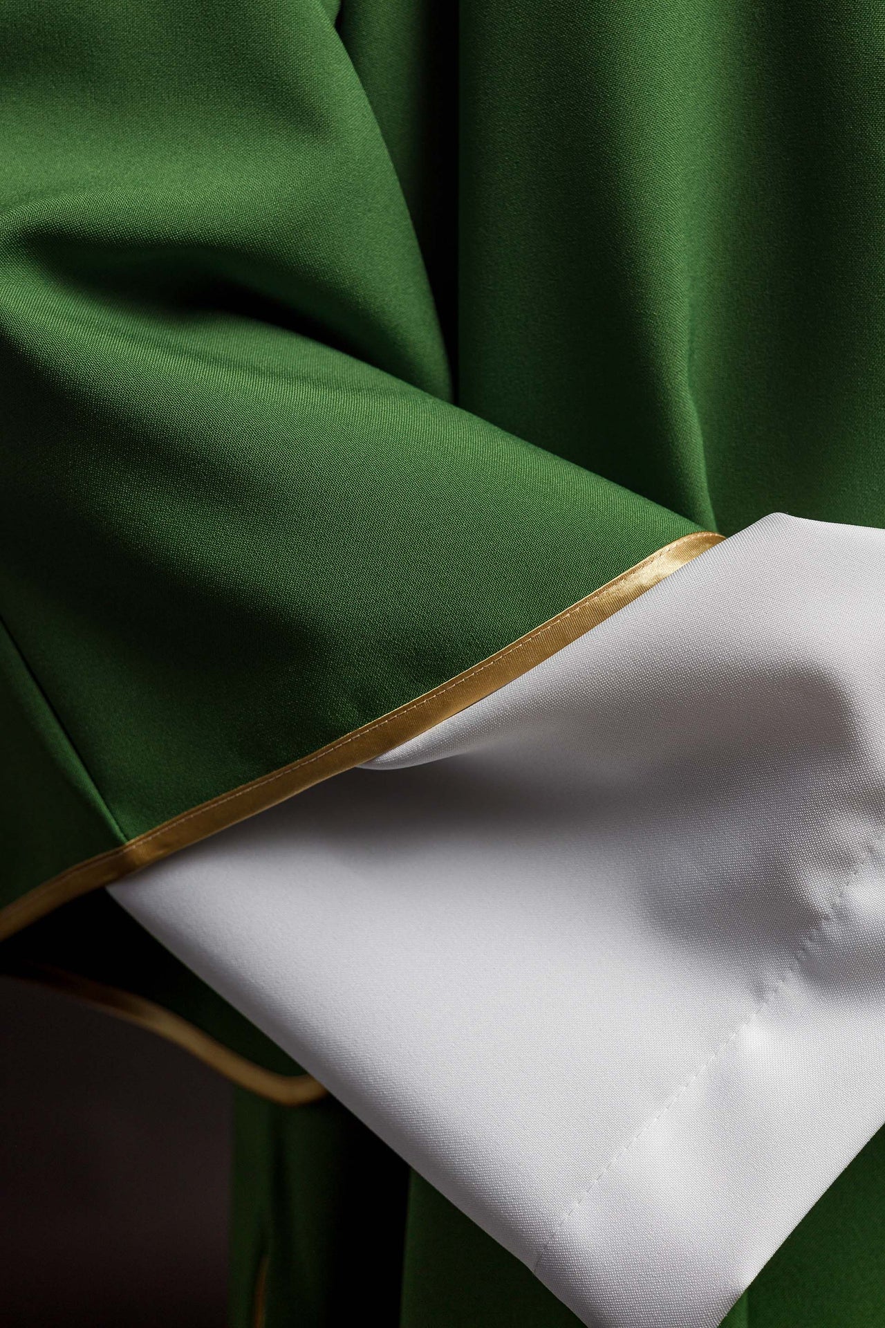 Green Dalmatian with embroidered gold IHS