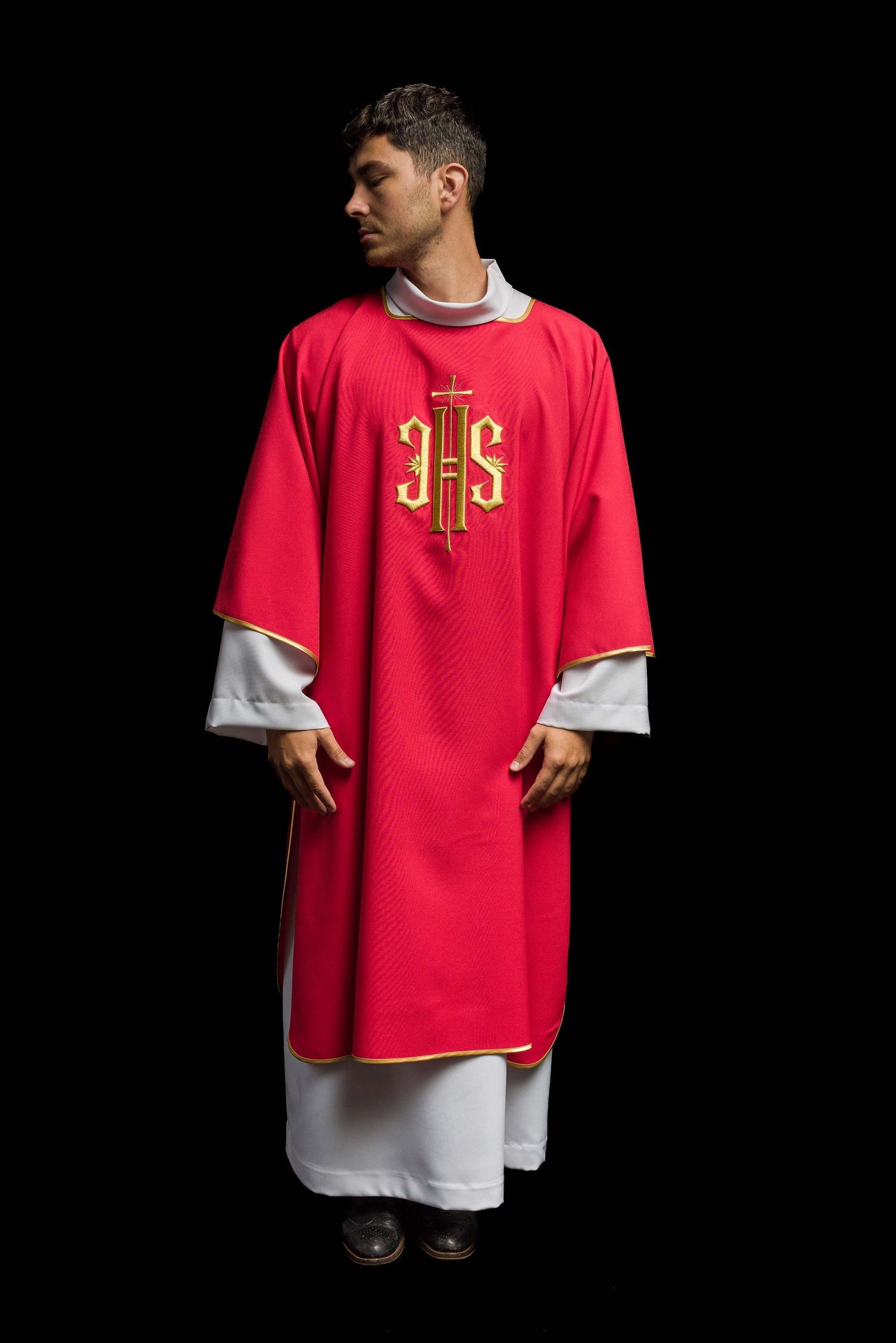 Red Dalmatics with embroidered gold IHS