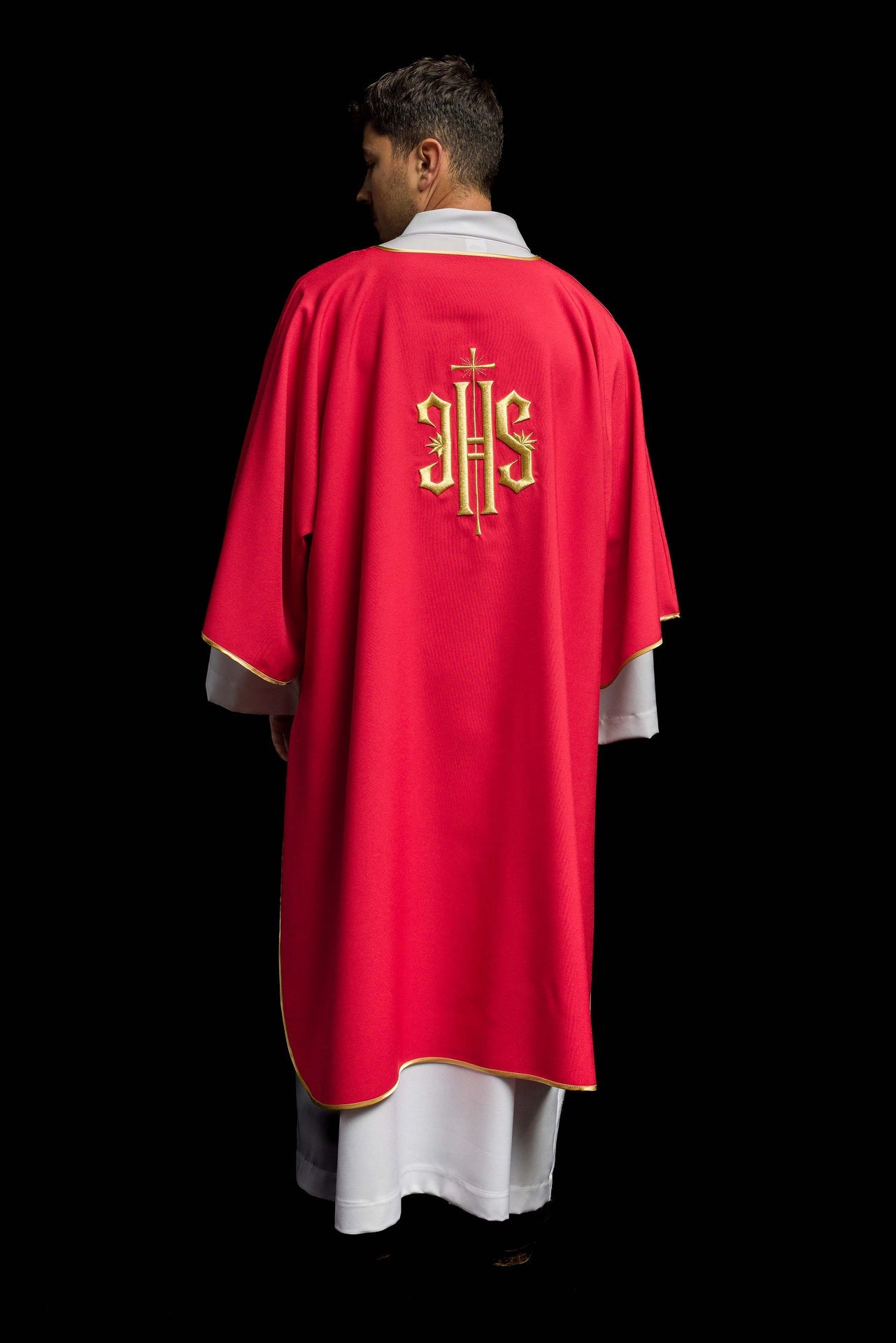 Red Dalmatics with embroidered gold IHS