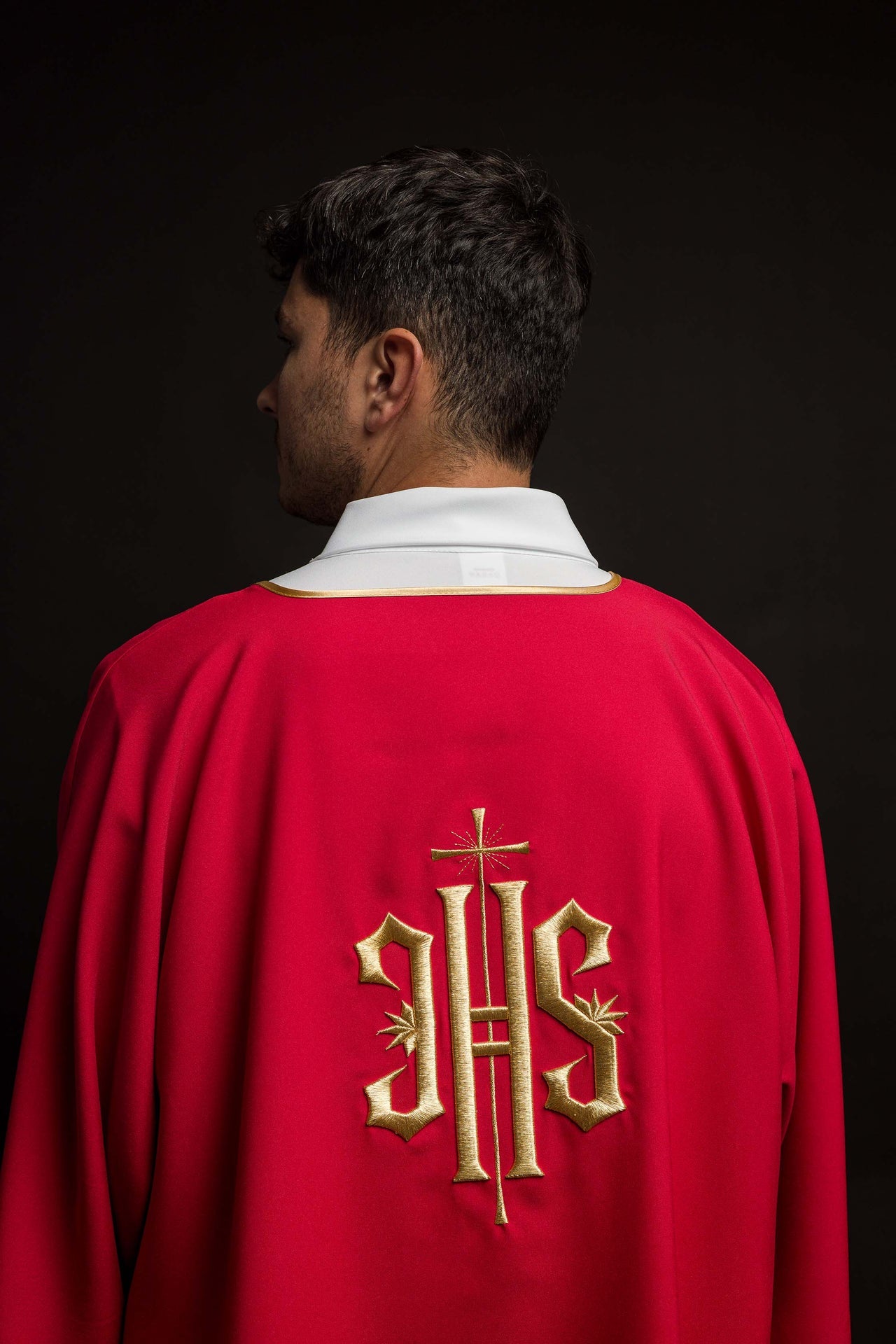 Red Dalmatics with embroidered gold IHS