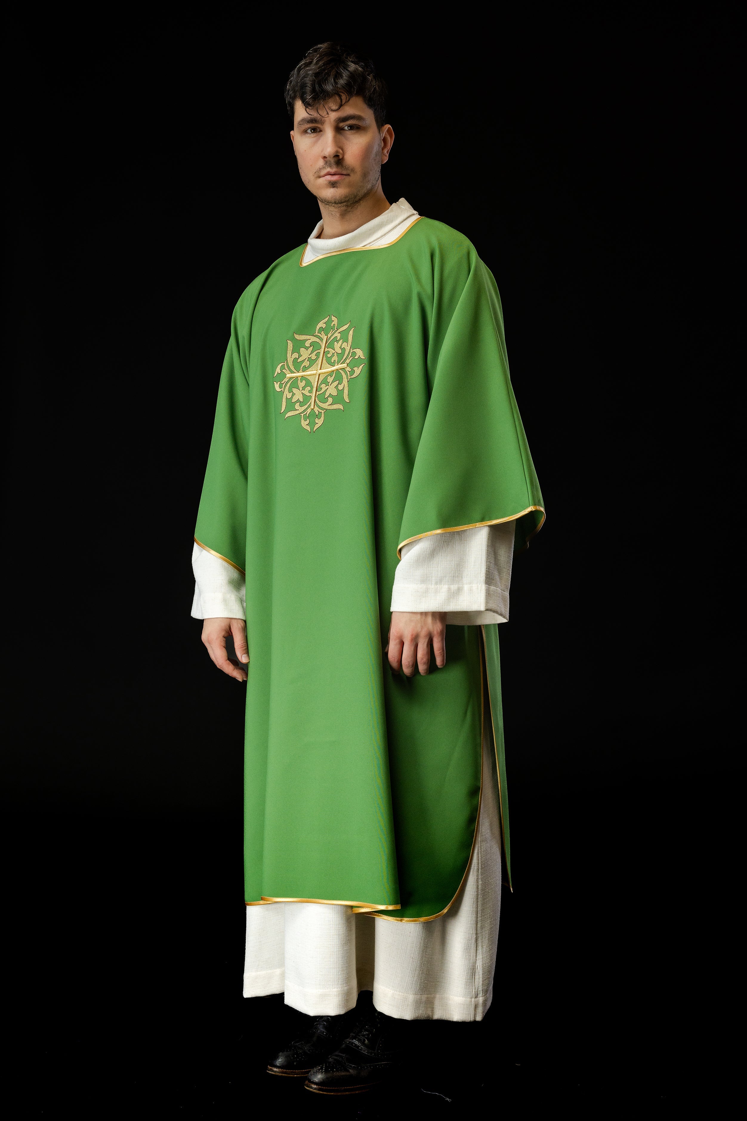 Green Dalmatian with embroidered gold cross