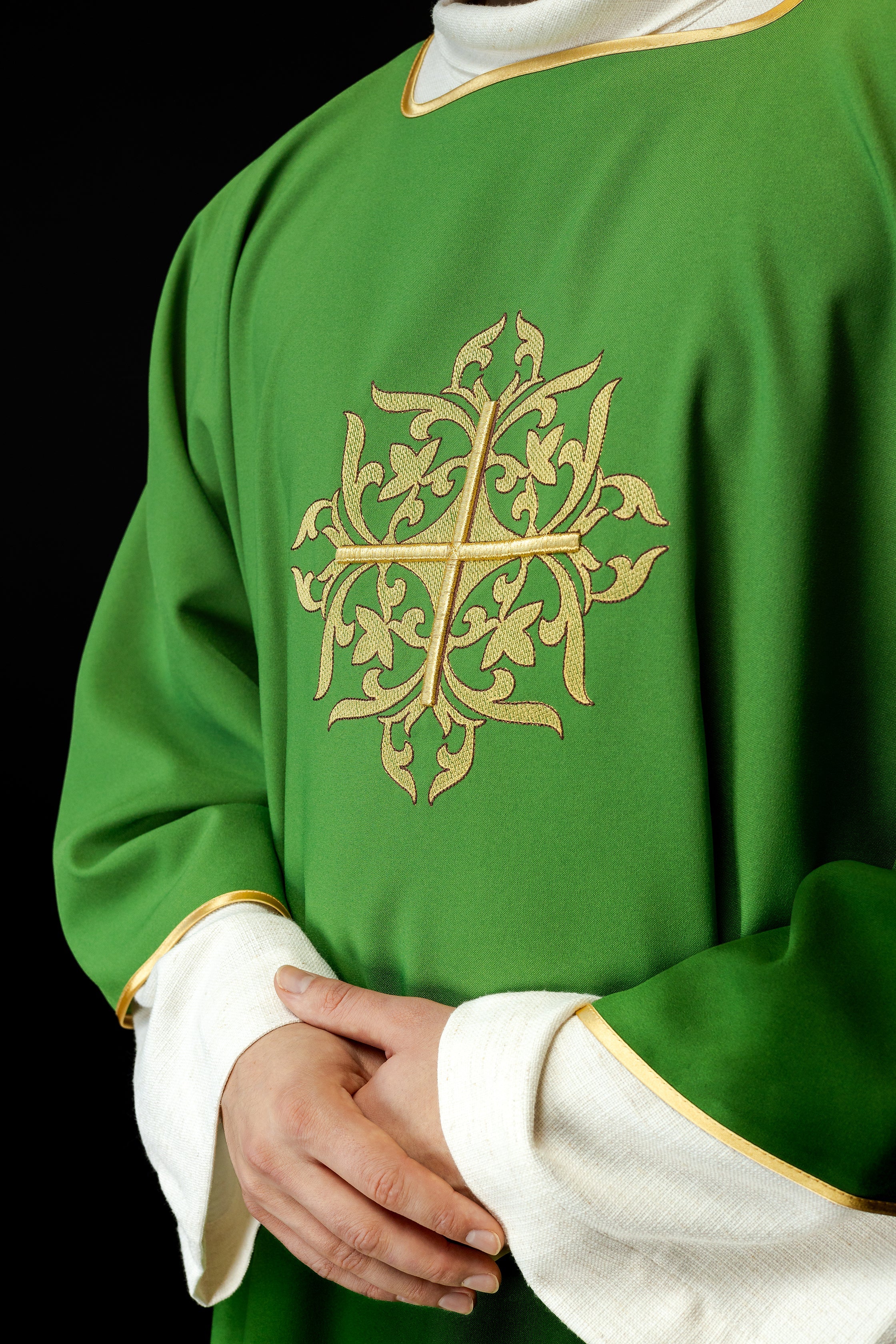 Green Dalmatian with embroidered gold cross