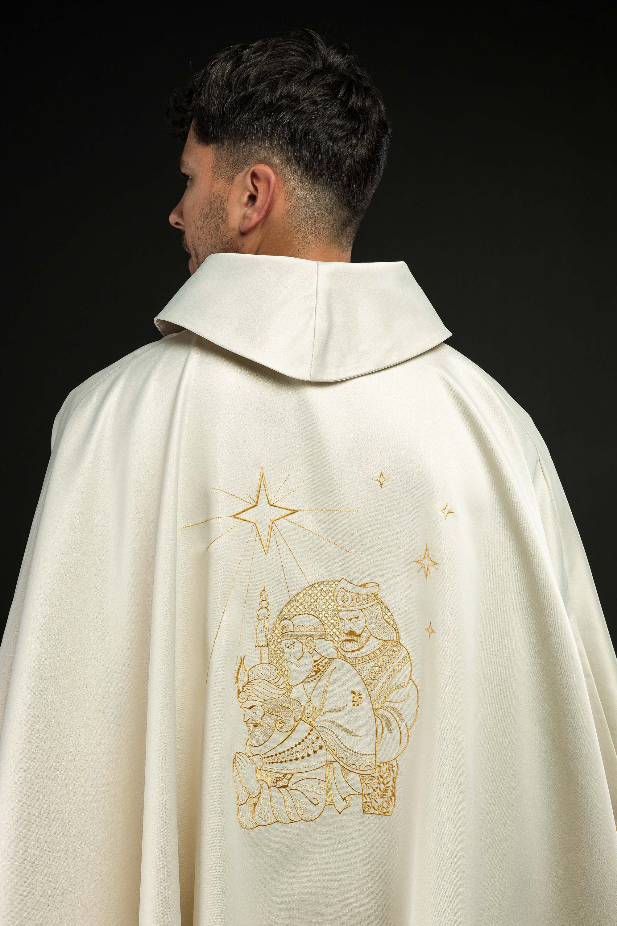 Glittering chasuble with gold embroidery and image of the Three Kings