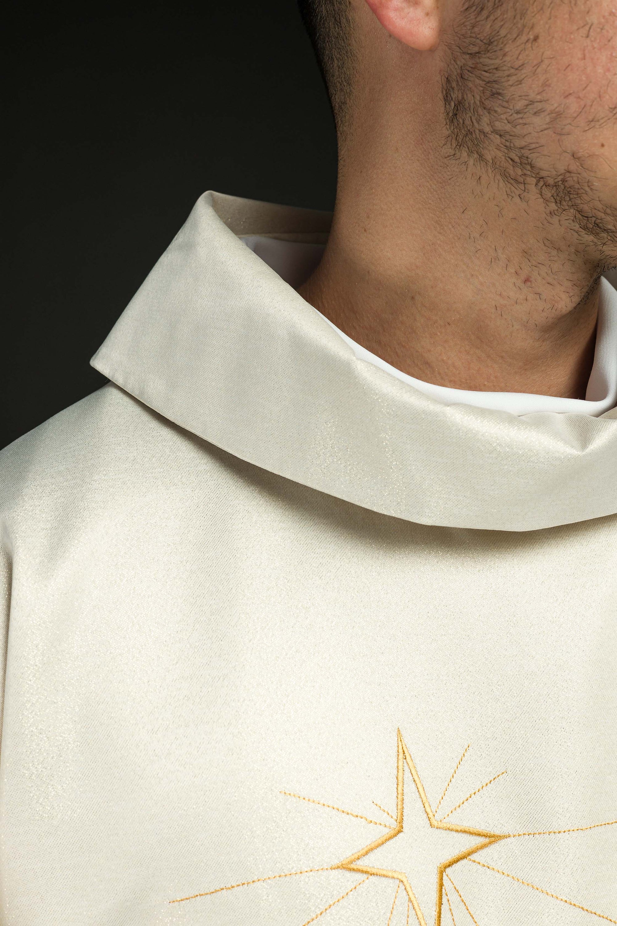Glittering chasuble with gold embroidery and image of the Three Kings