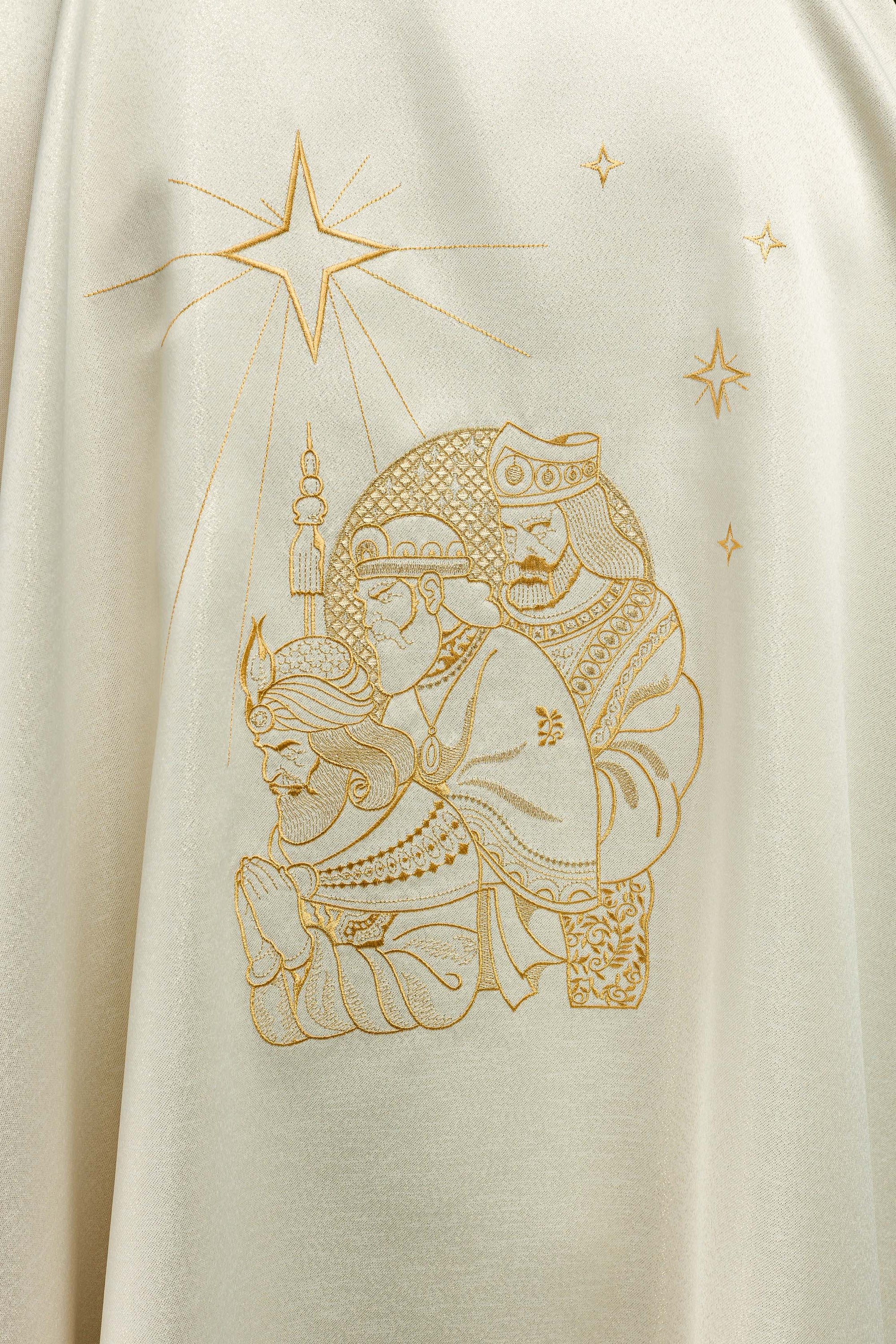 Glittering chasuble with gold embroidery and image of the Three Kings