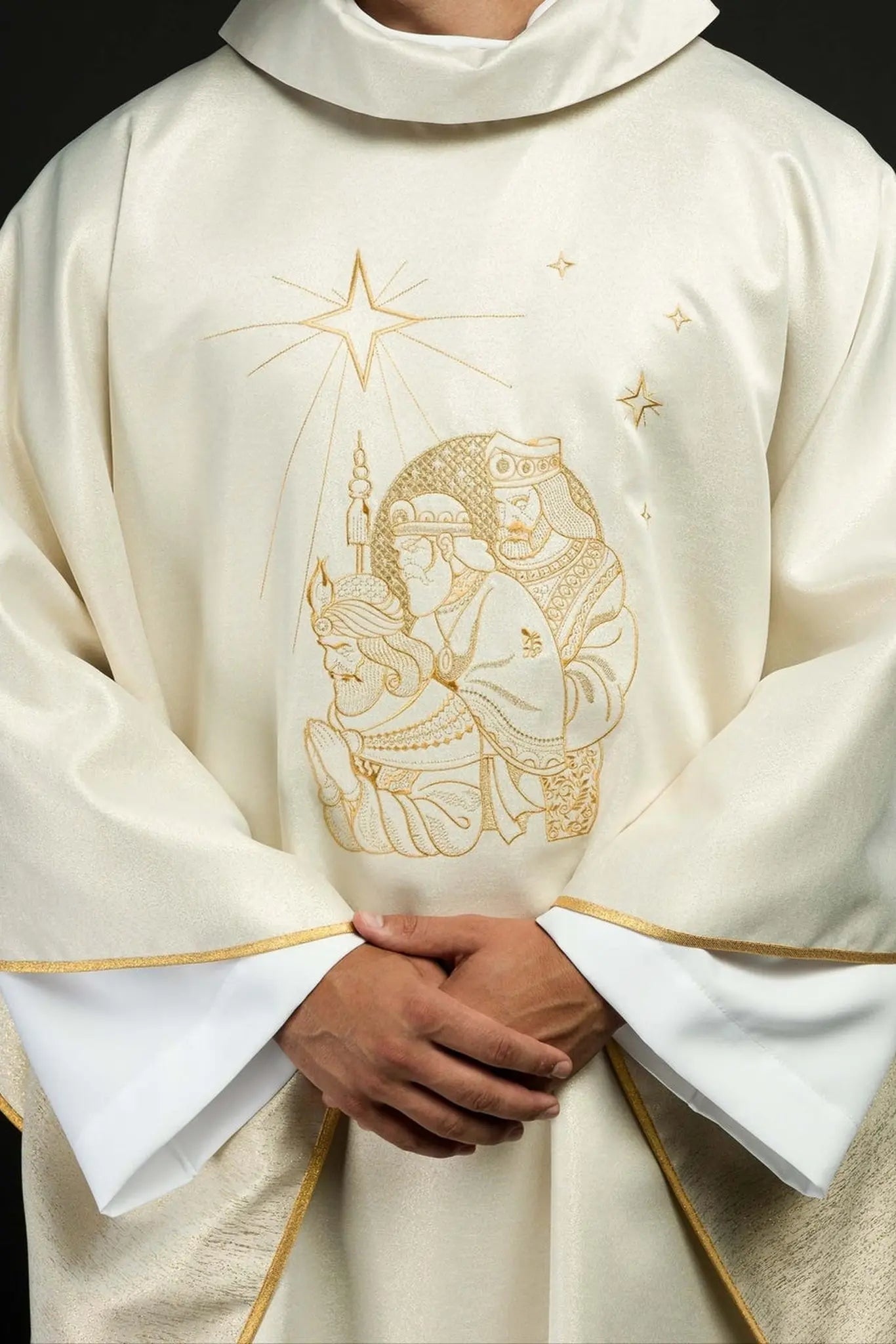 Glittering chasuble with gold embroidery and image of the Three Kings