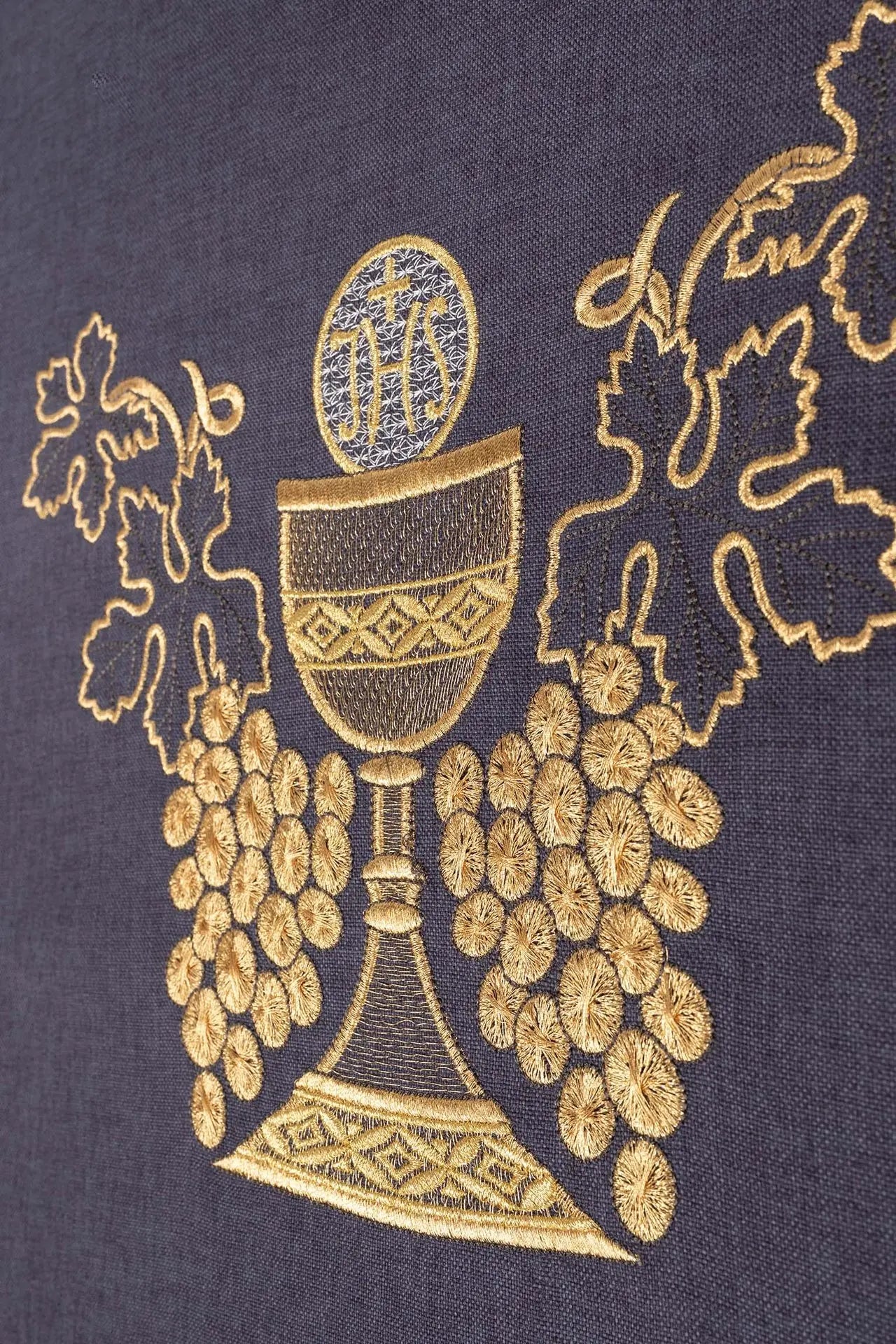 Embroidered purple chasuble with a chalice and grapes