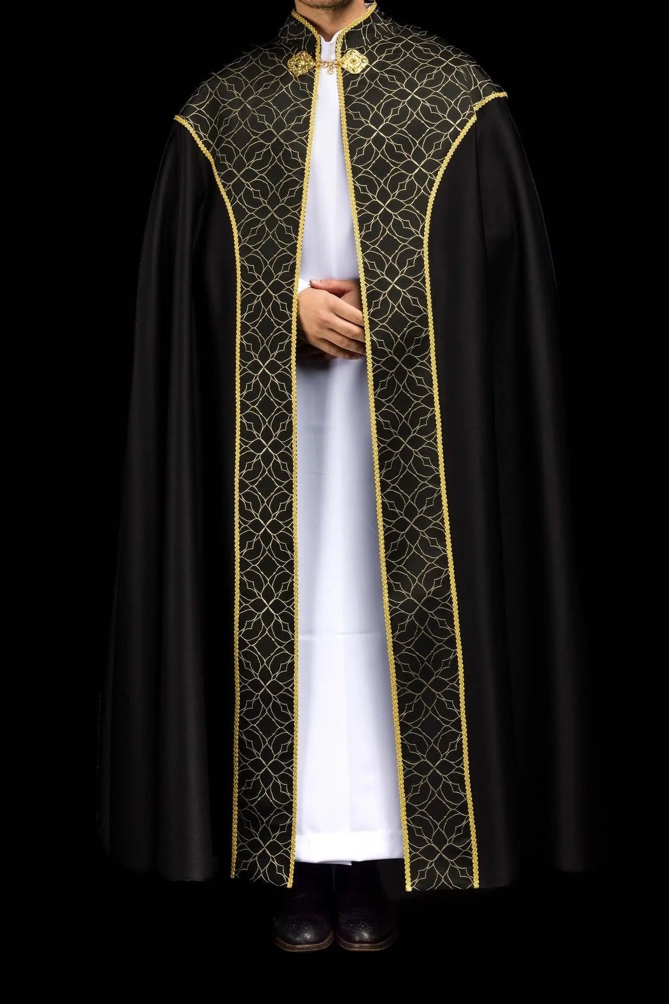 Embroidered black cope decorated with jacquard fabric