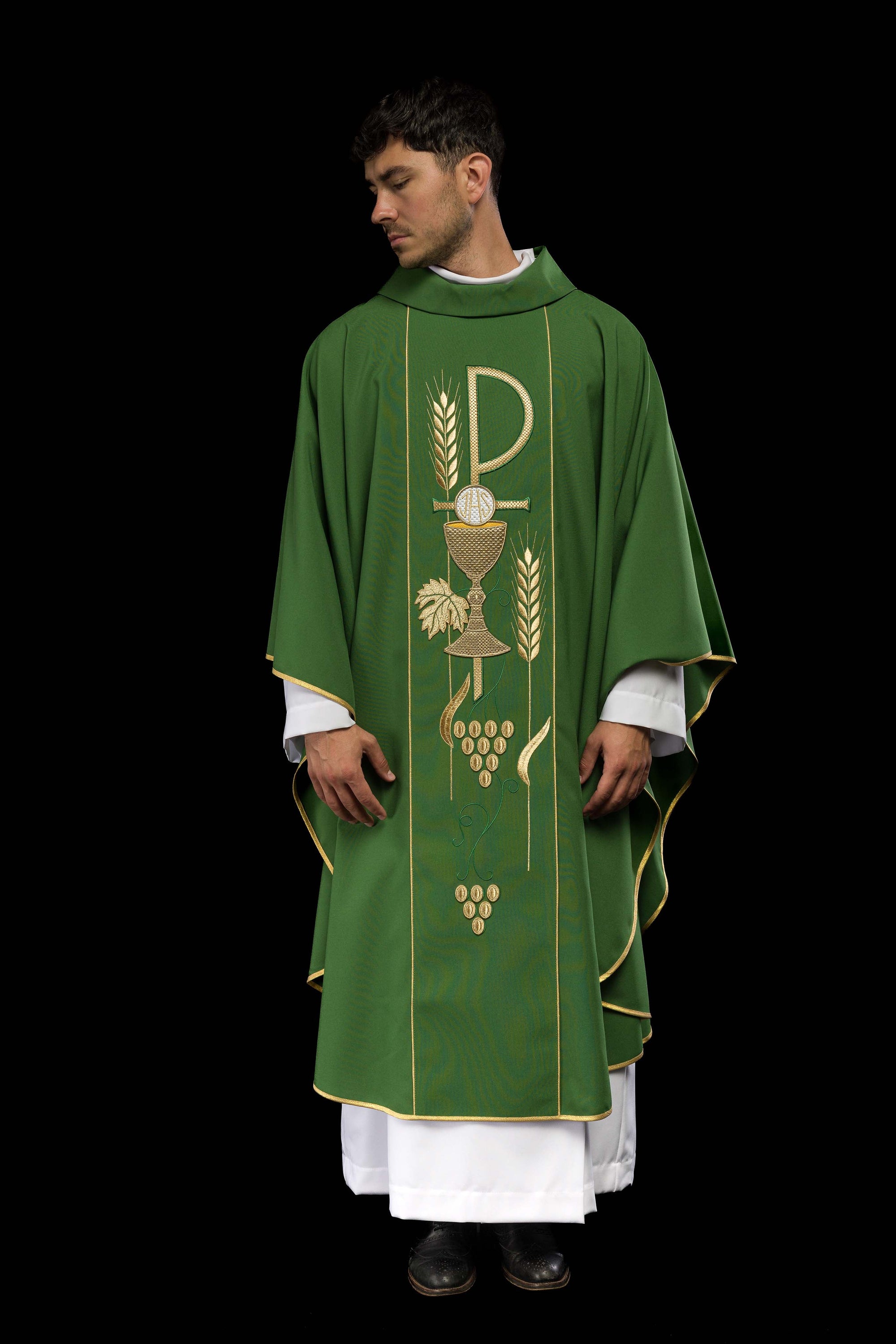 Green chasuble embroidered with IHS chalice design