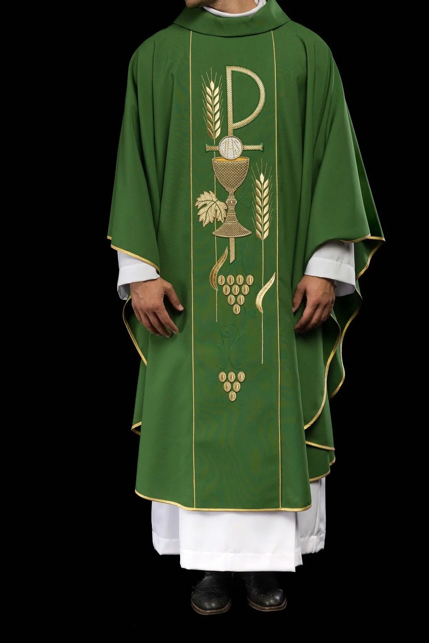 Green chasuble embroidered with IHS chalice design