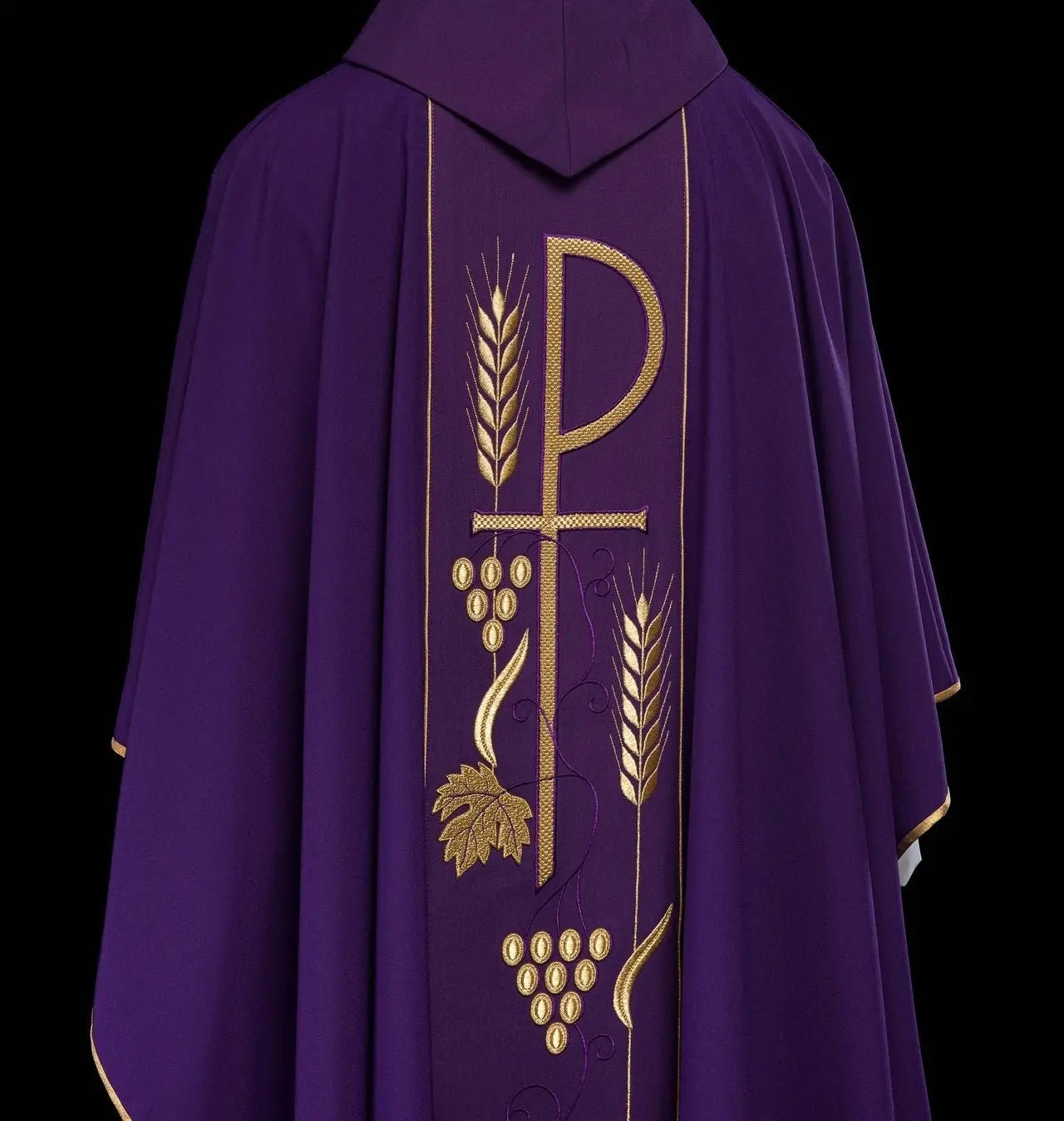 Purple chasuble embroidered with IHS chalice pattern