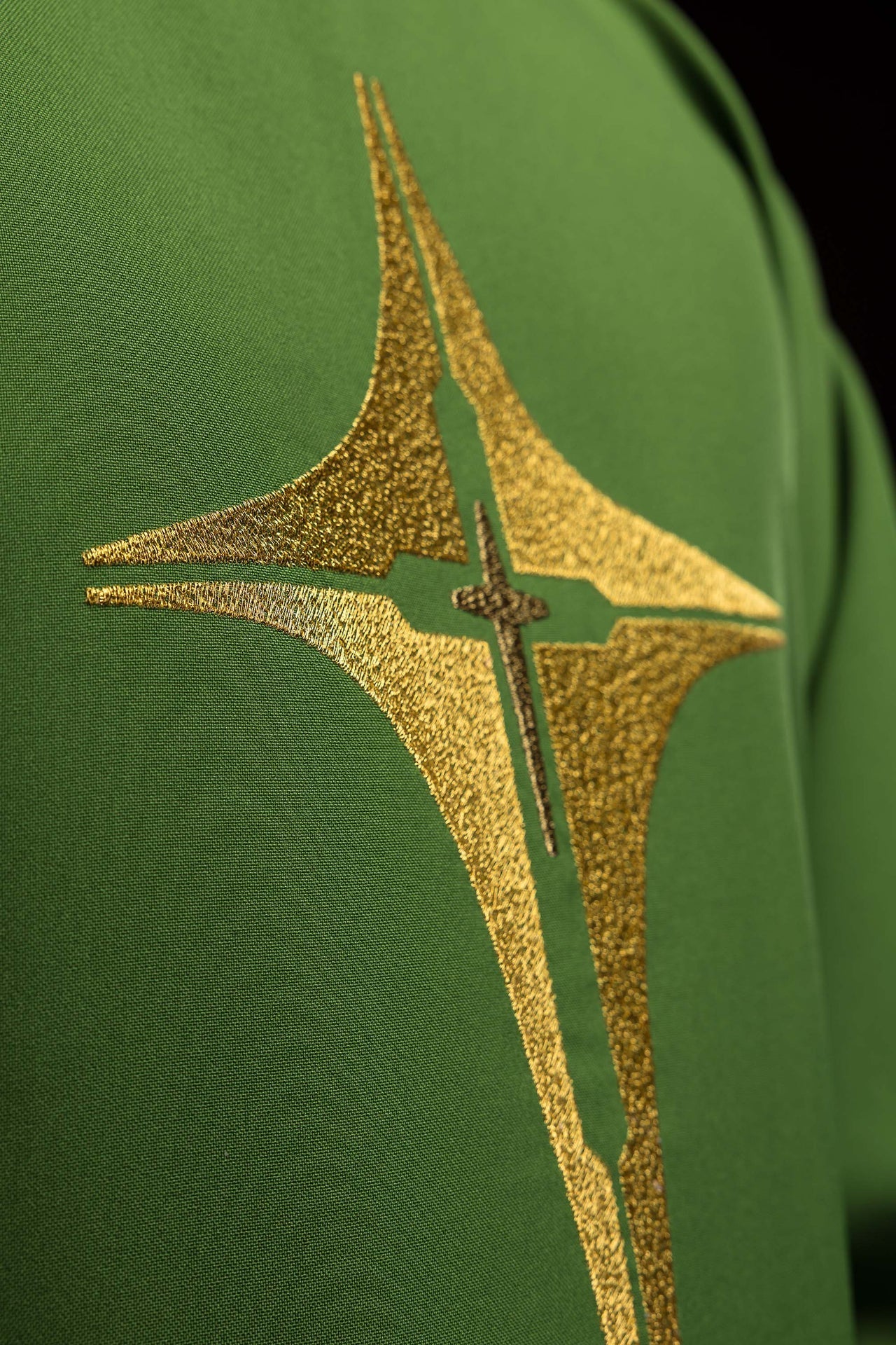 Green chasuble embroidered with cross motif