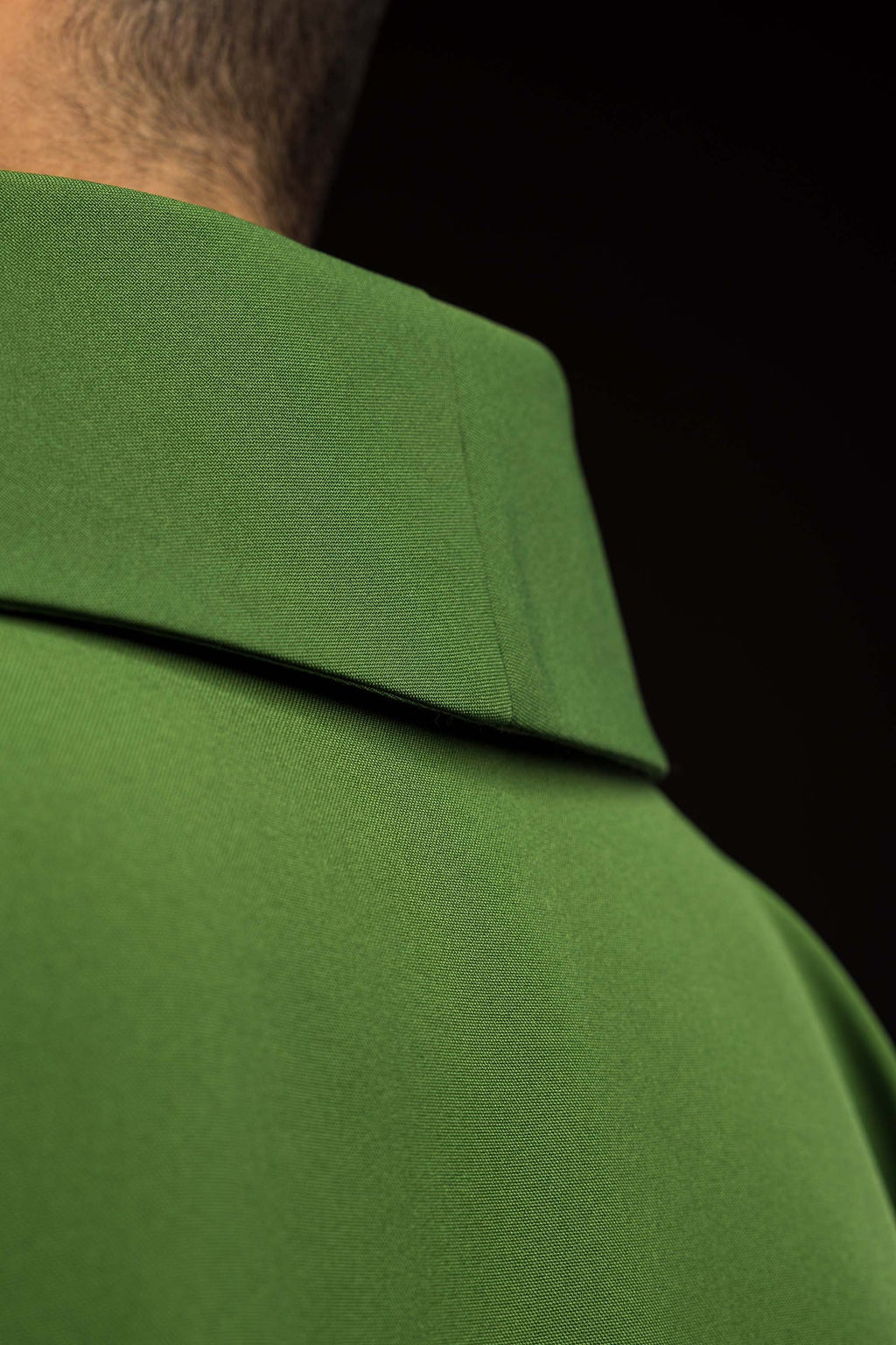 Green chasuble embroidered with cross motif