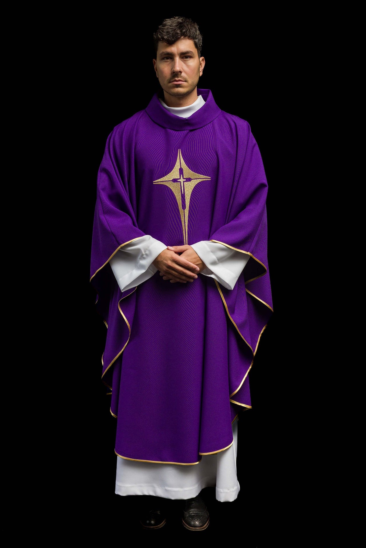 Purple chasuble embroidered with cross motif
