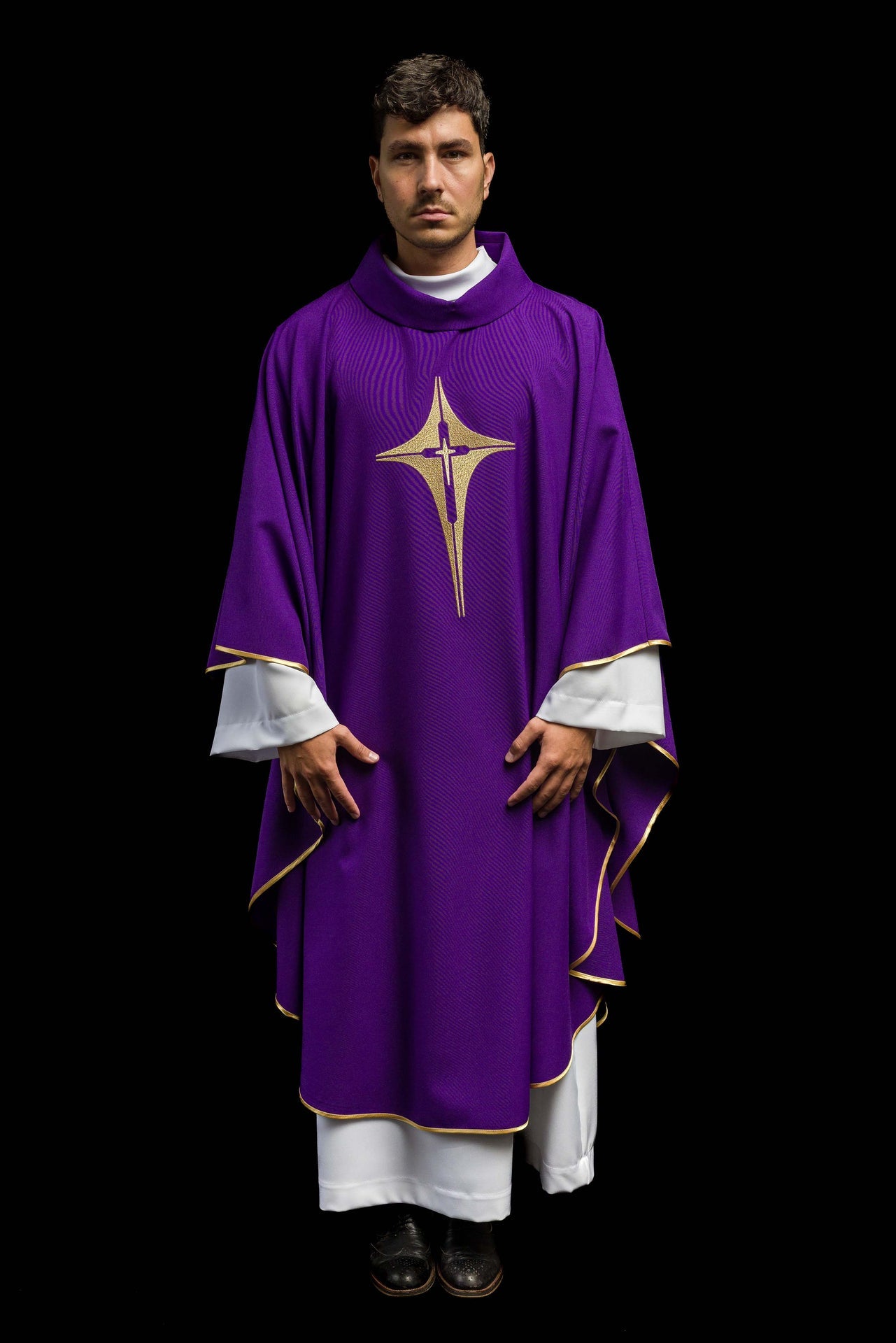 Purple chasuble embroidered with cross motif