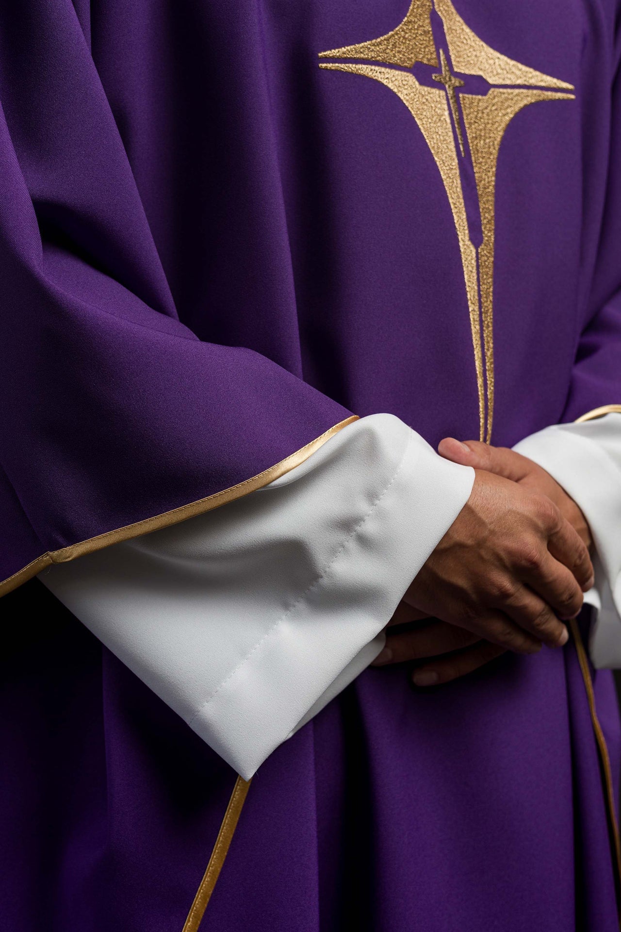 Purple chasuble embroidered with cross motif