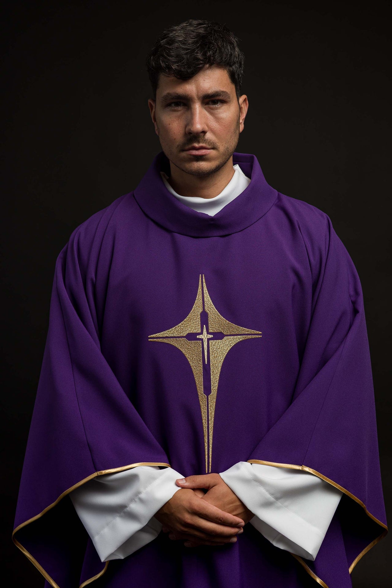 Purple chasuble embroidered with cross motif