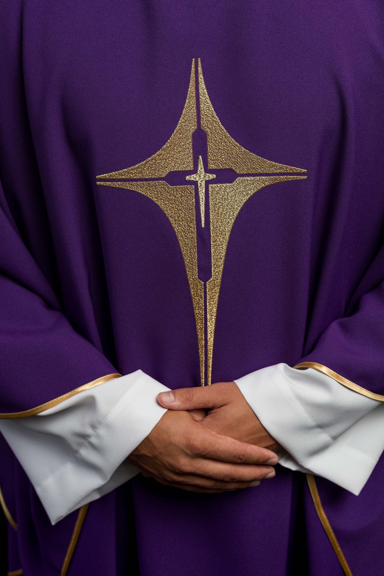 Purple chasuble embroidered with cross motif