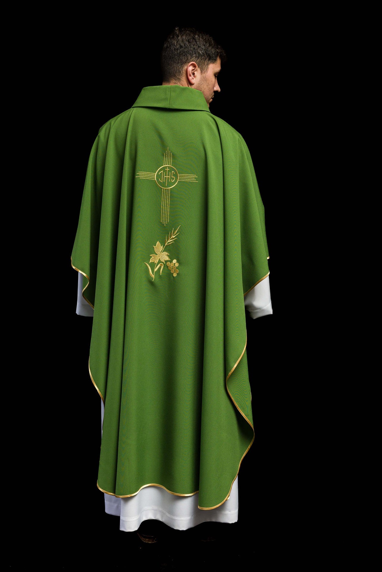 Green chasuble embroidered with IHS motif